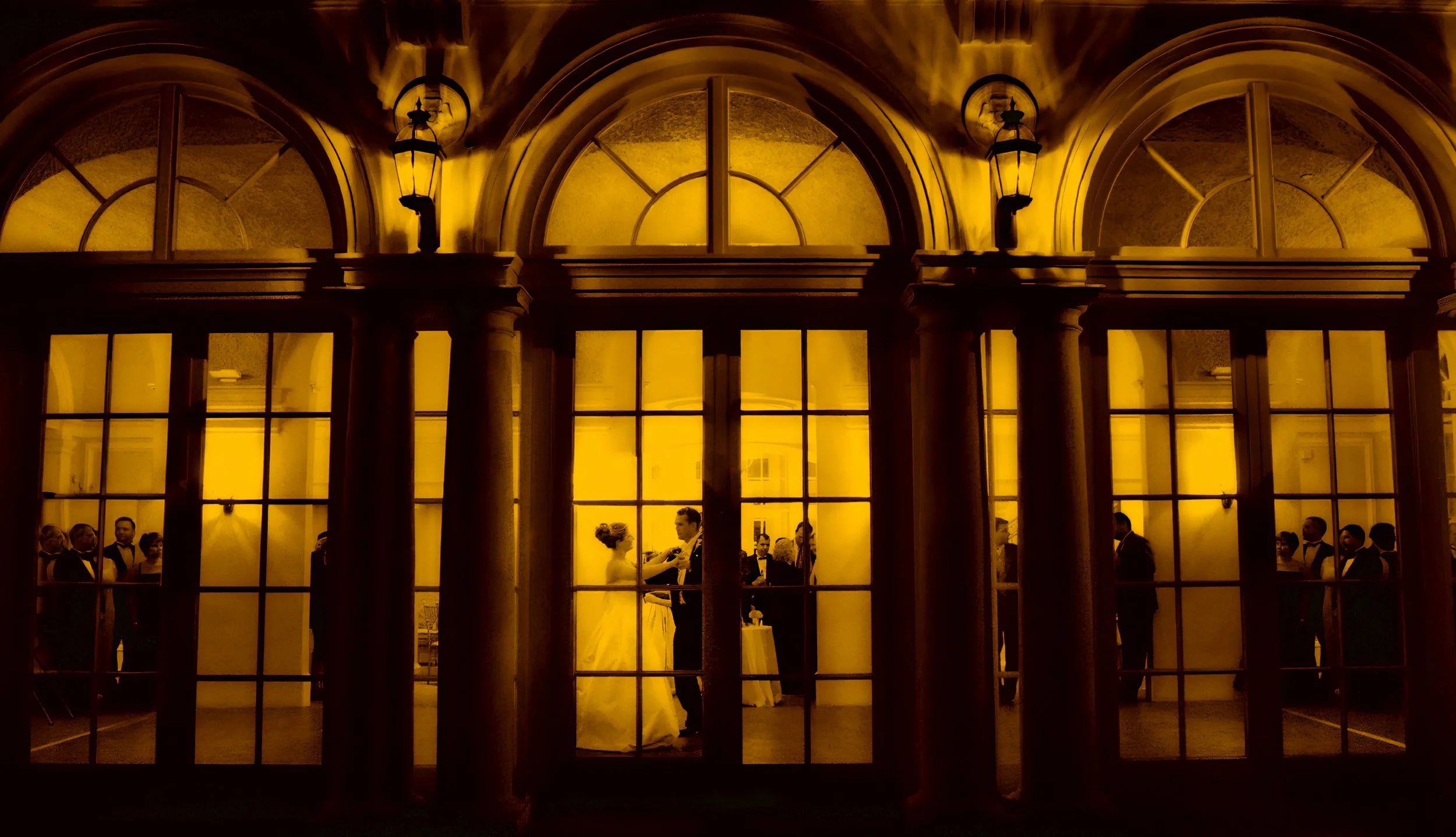 Bride and groom share their first dance inside Wadsworth Mansion surrounded by grand architecture and elegant reception lighting