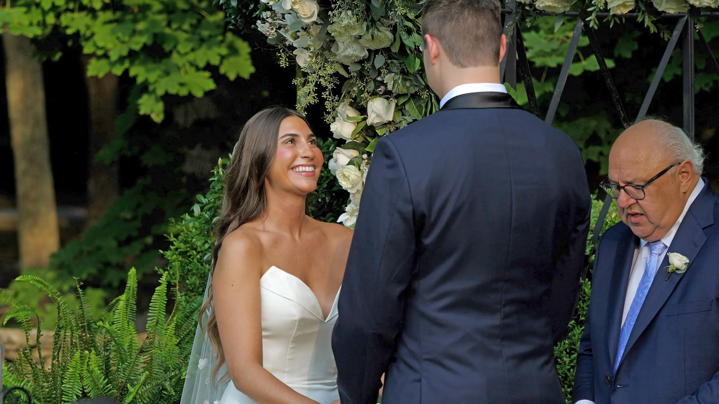 Emotional wedding vows in side garden ceremony at Lord Thompson Manor Connecticut