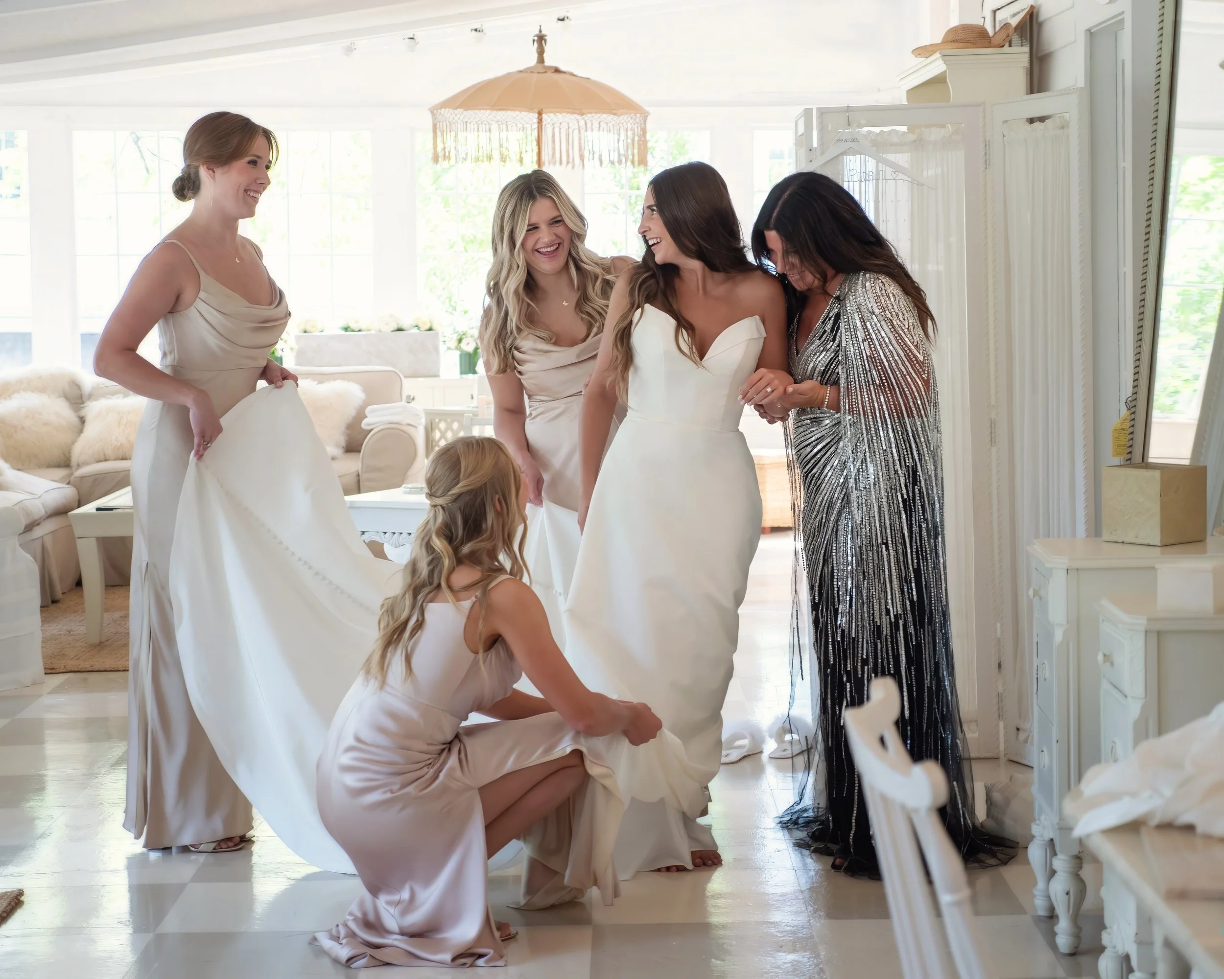 Bridal preparations with family and bridesmaids at Cottage House Lord Thompson Manor Caption: