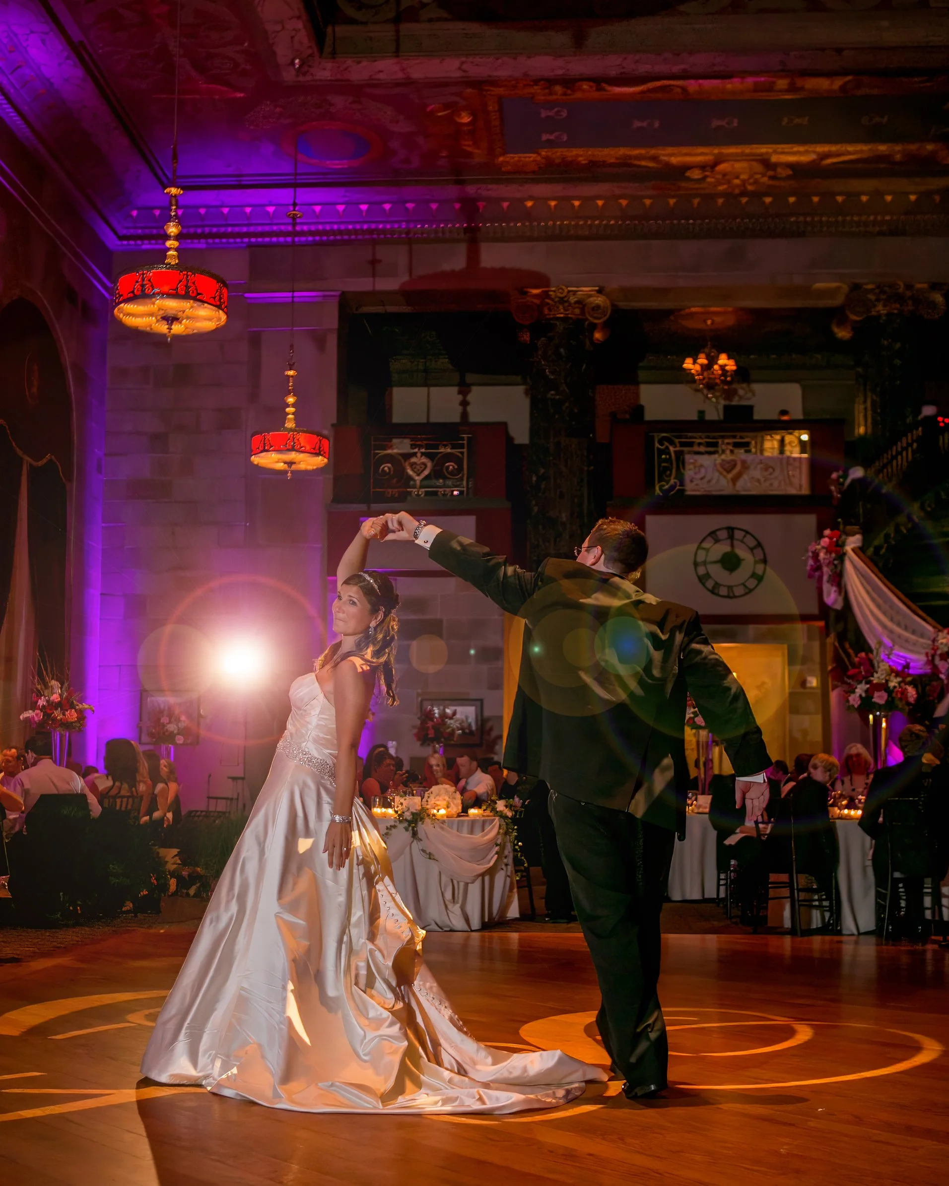 Groom spinning bride on dance floor at The Society Room of Hartford wedding