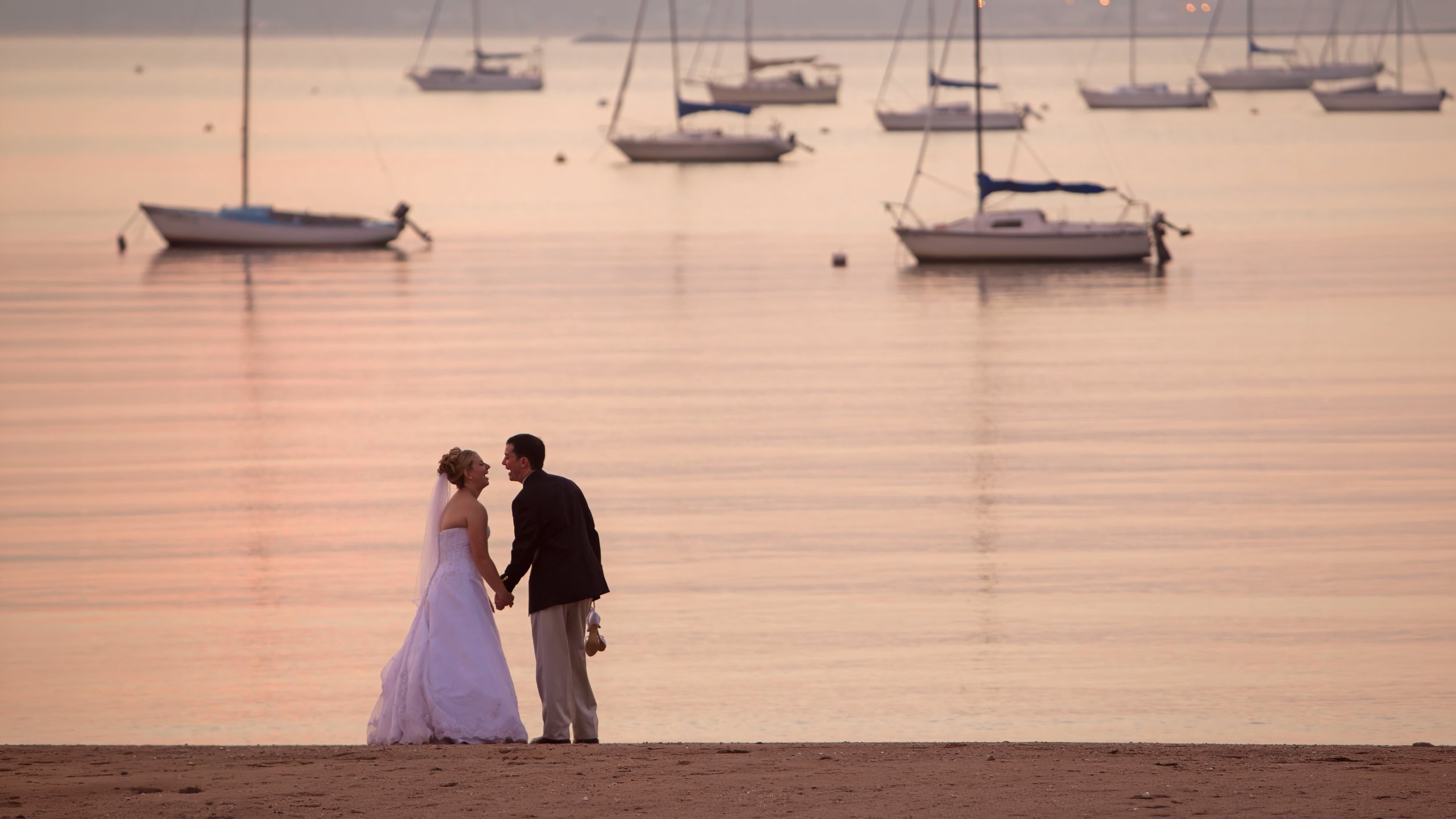 anthonys-ocean-view-wedding-beach-sailboats-bride-groom.jpg