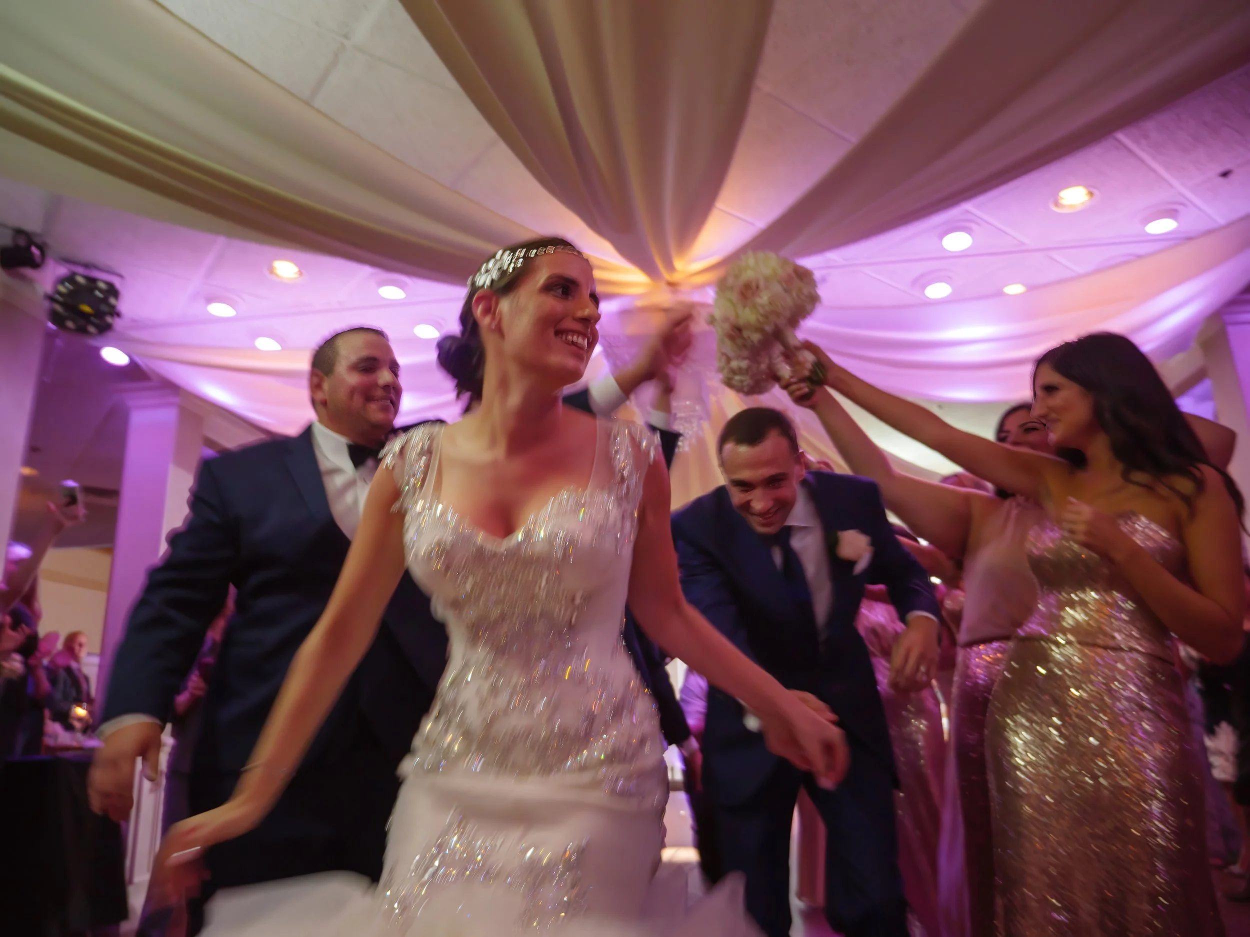 anthonys-ocean-view-wedding-reception-grand-entrance-motion-blur.jpg