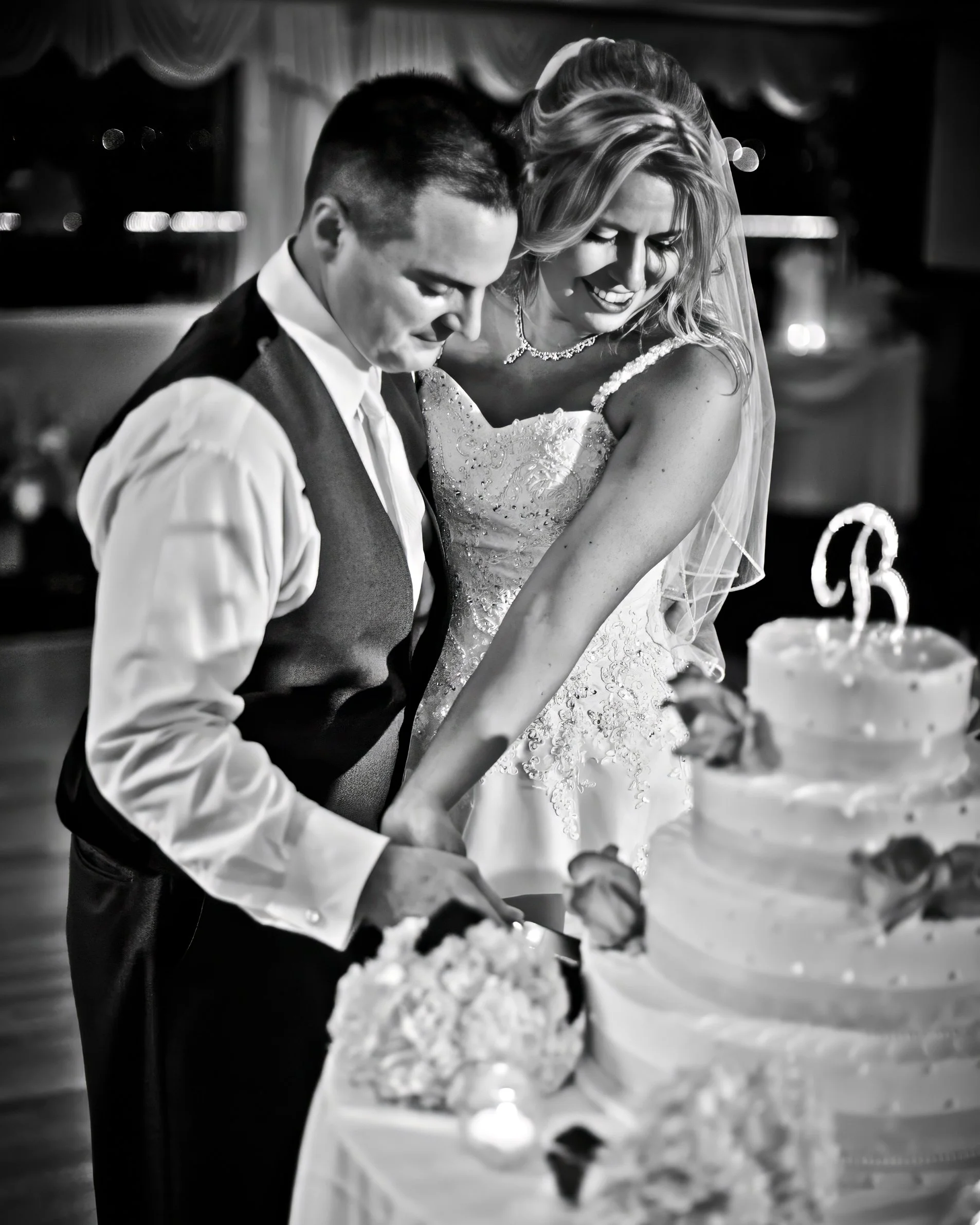 Black and White Cake Cutting at Amarante’s Sea Cliff Wedding