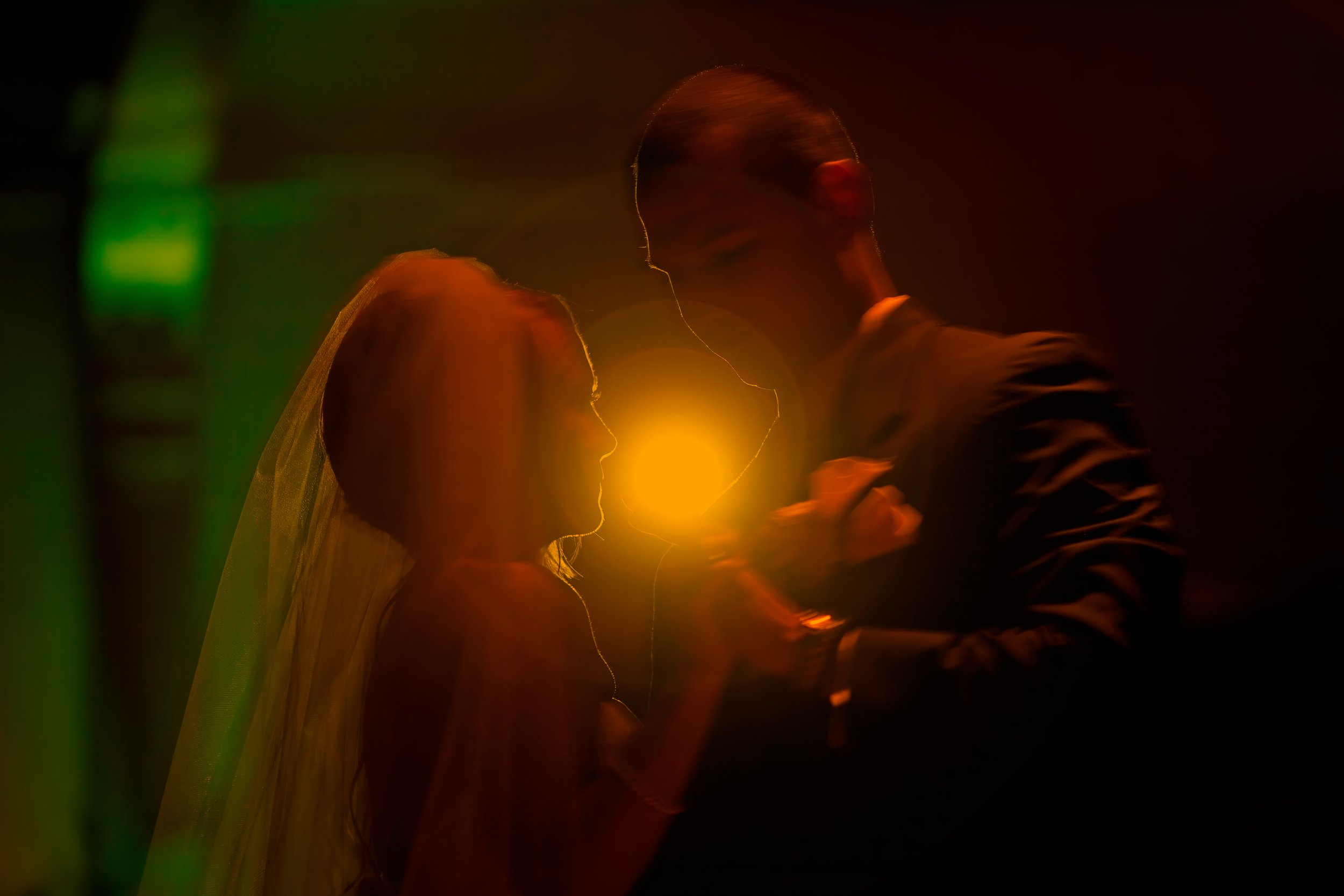 Motion blur first dance photograph of bride and groom in the ballroom at Amarante’s Sea Cliff