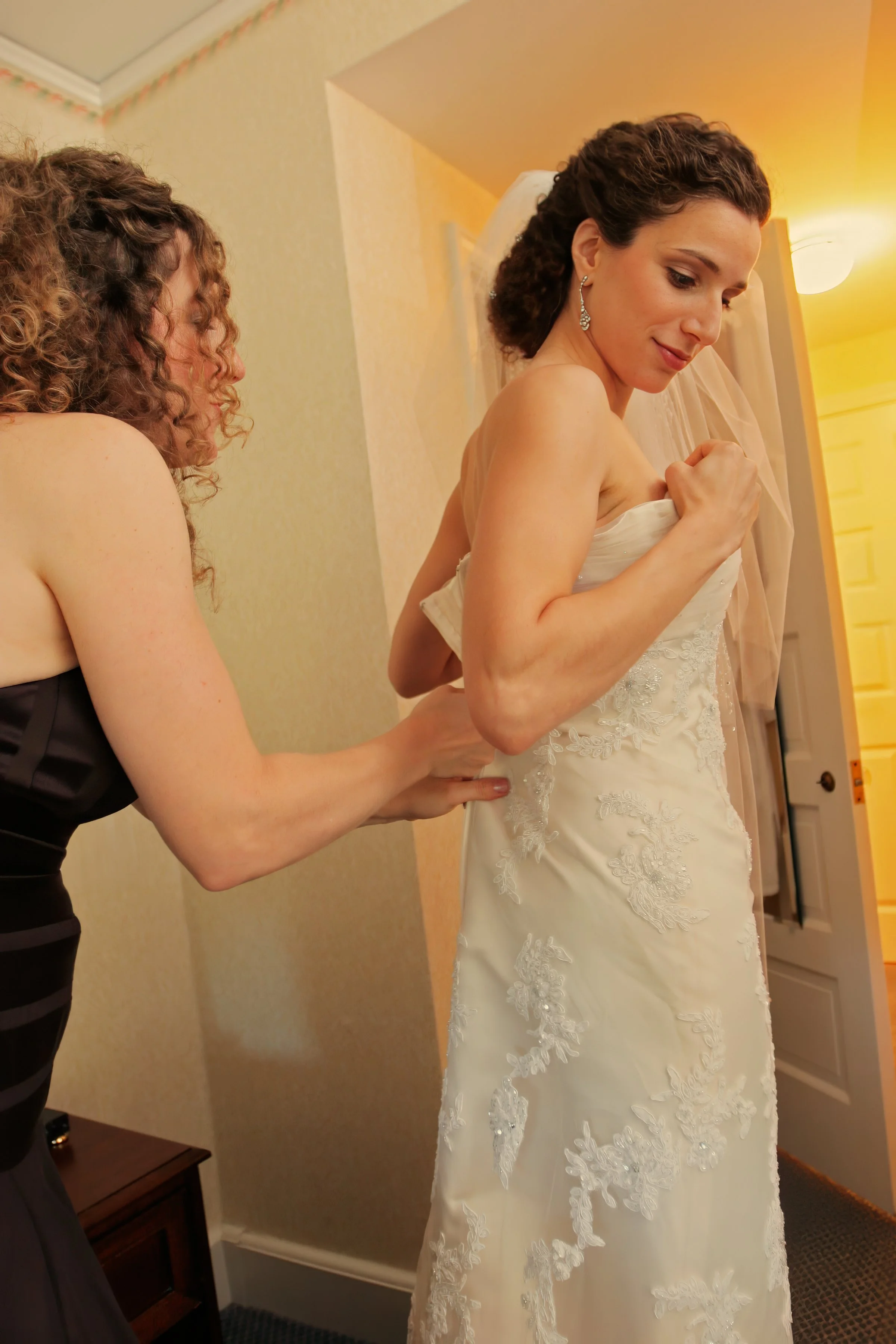 Bridal Dress Assistance Moment