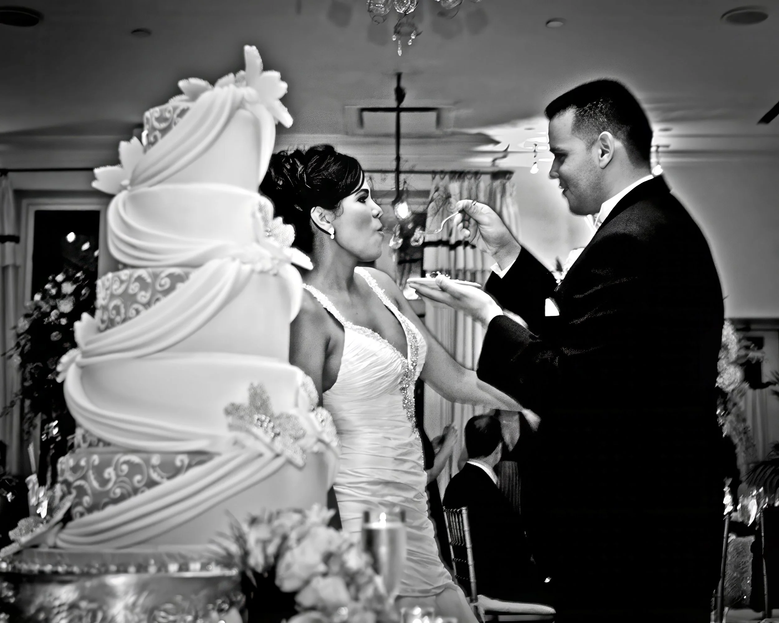 Cake Feeding Moment at Wedding Reception