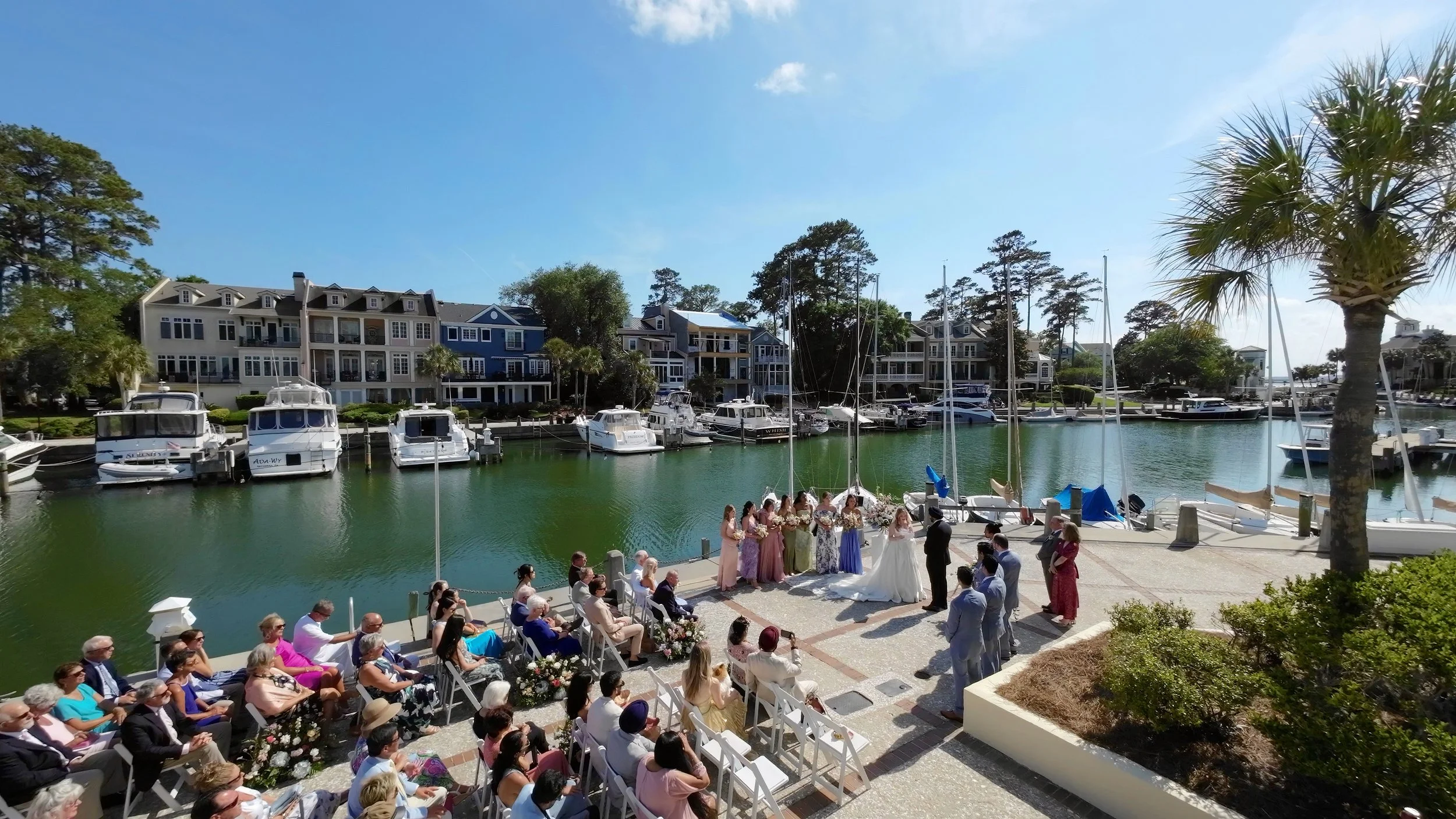 Outdoor wedding ceremony overlooking marina at South Carolina Yacht Club Hilton Head