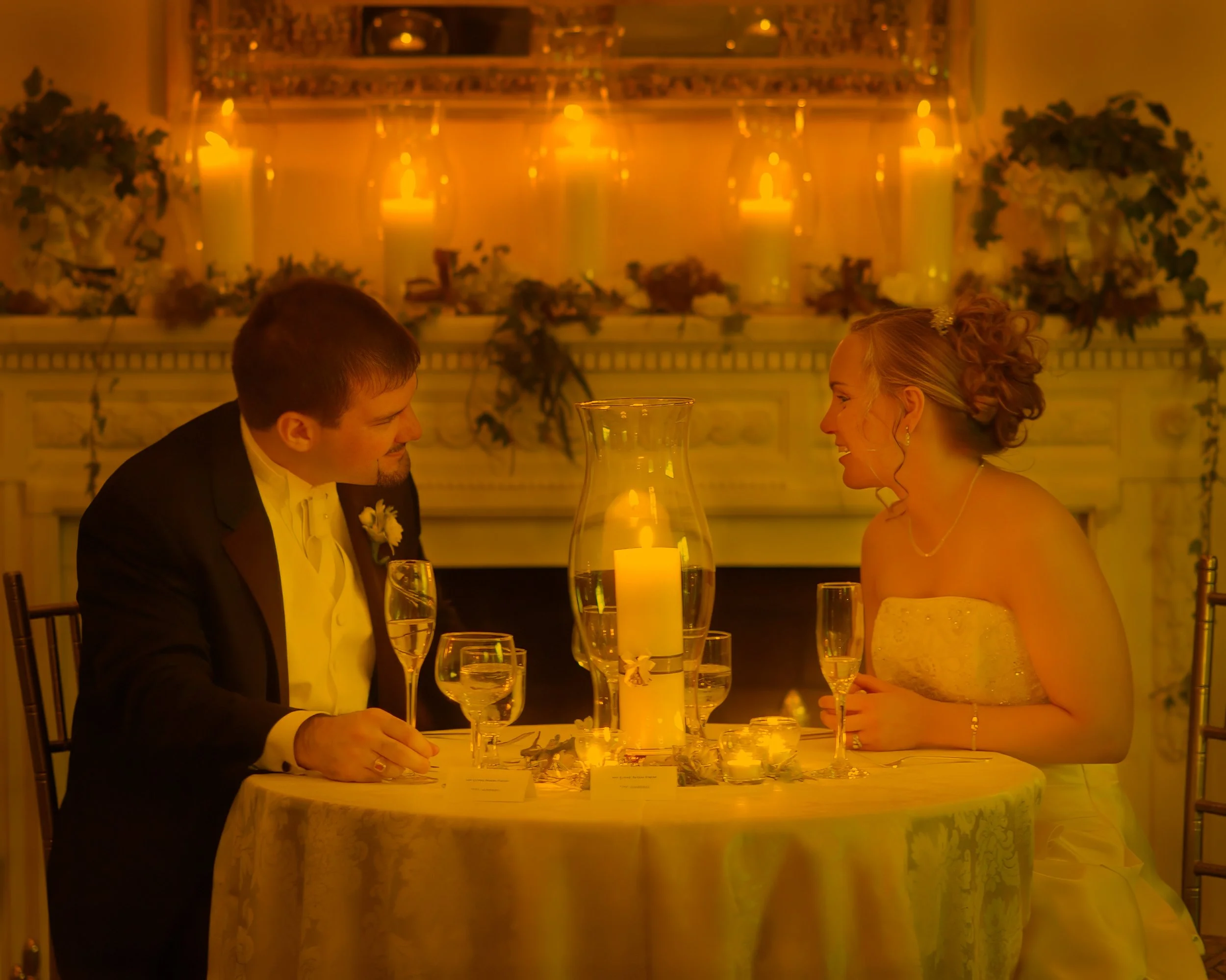 Bride and groom sharing authentic dinner conversation at Wadsworth Mansion wedding in Connecticut