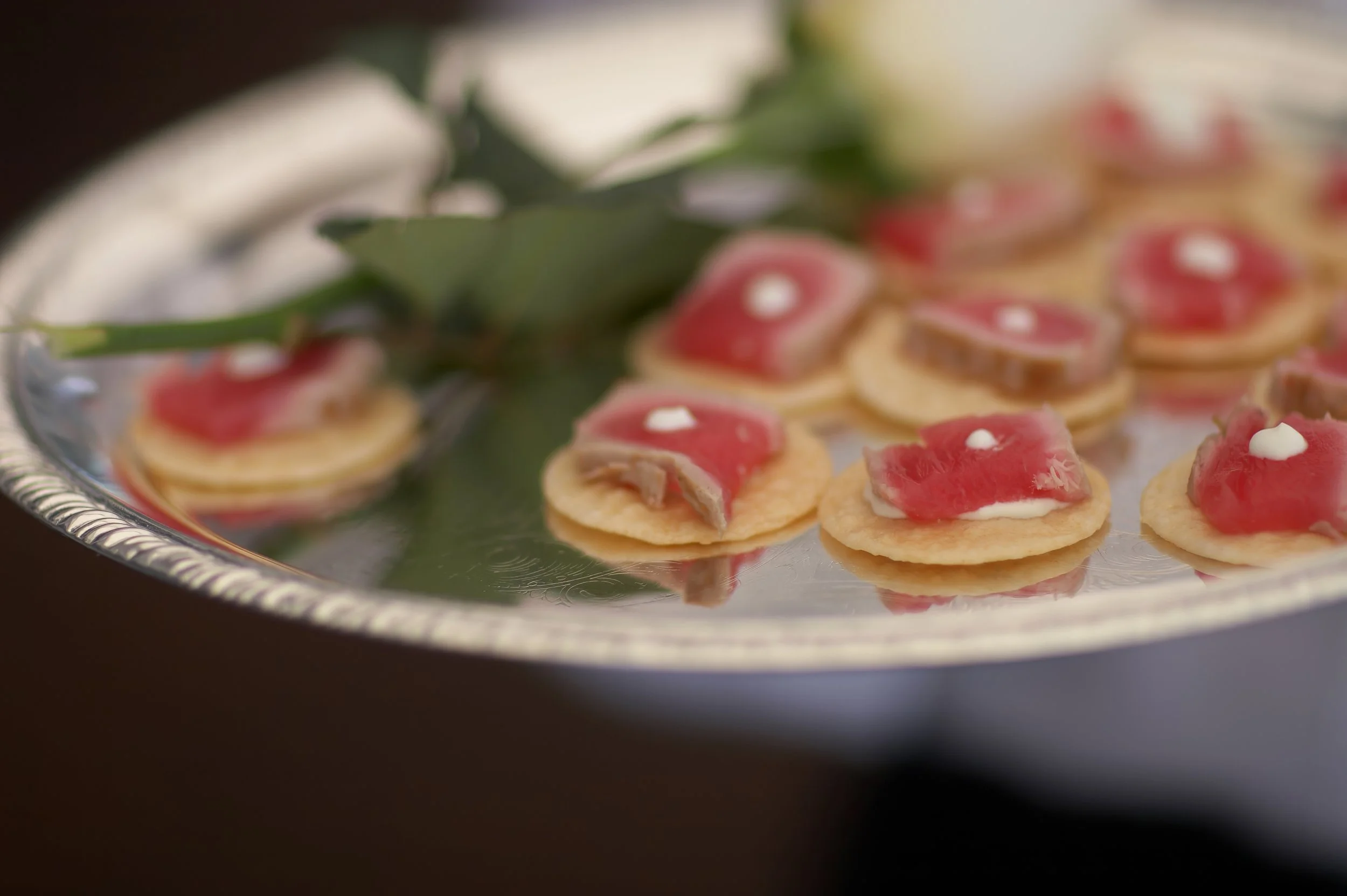Seared tuna hors d'oeuvres served during cocktail hour at Belle Haven Yacht Club wedding.