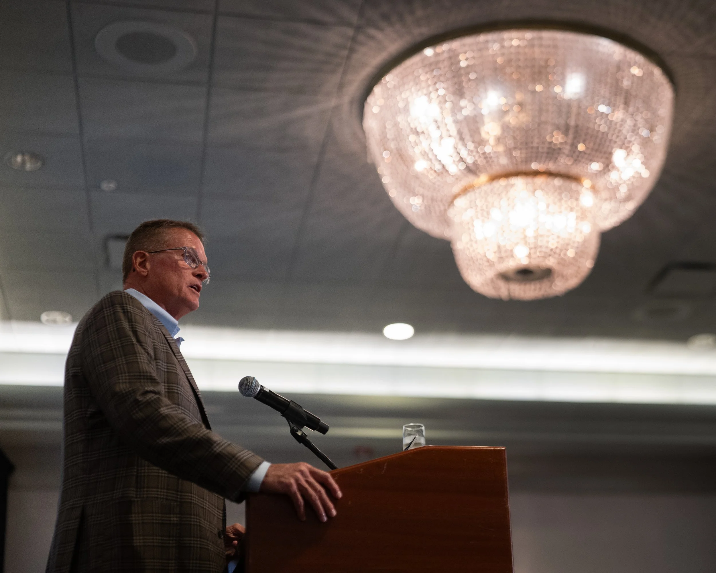 Speakers presenting on stage during a corporate event at Sonesta Resort Hilton Head.