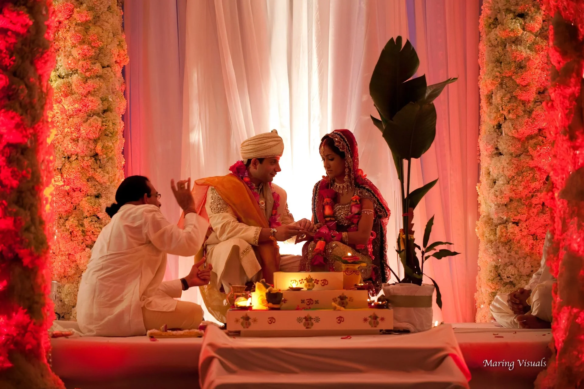 Bride and Groom exchange rings at their wedding ceremony at the Mandarin Oriental Hotel NYC