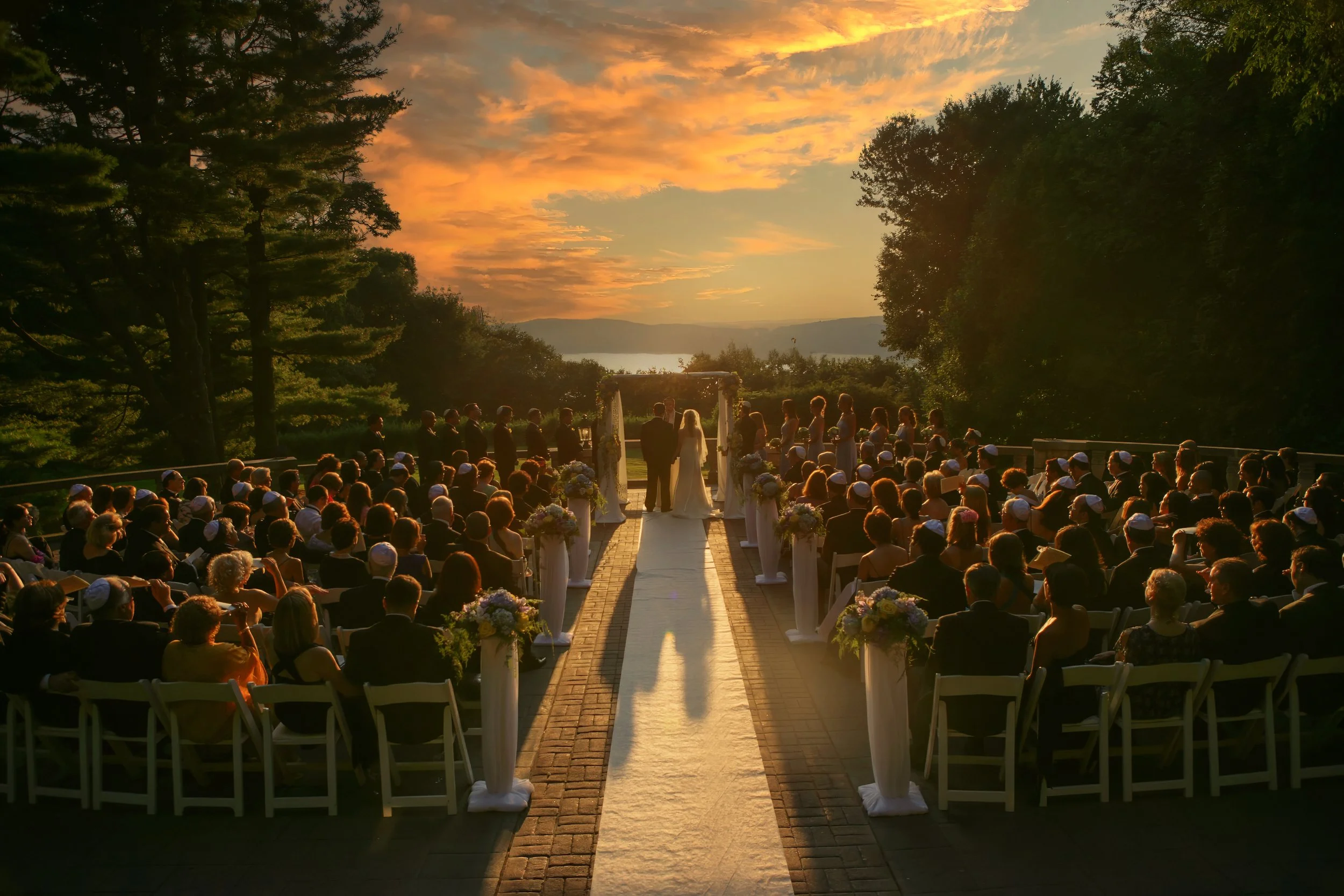 An outdoor wedding ceremony at Tappan Hill Mansion in Westchester NY