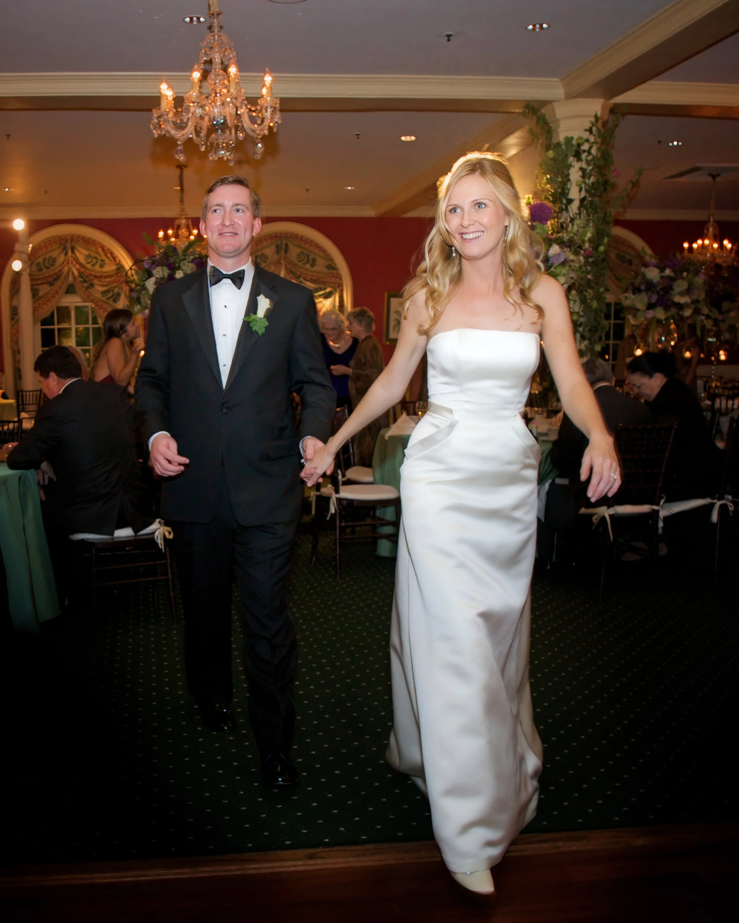 Bride and groom make their grand entrance into the Siwanoy Country Club wedding reception.