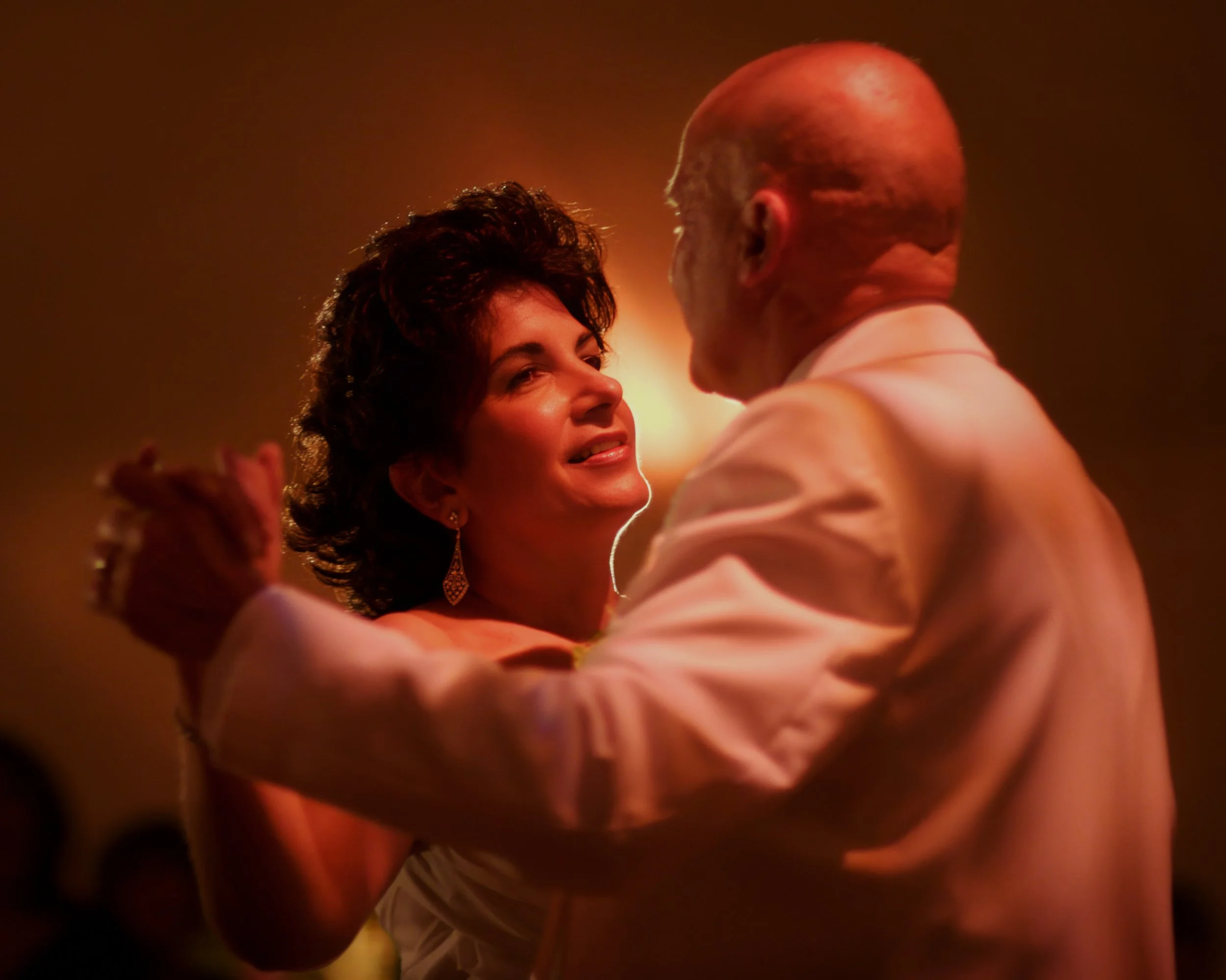 Bride and groom sharing a romantic dance captured by Maring Visuals at a New London County wedding.