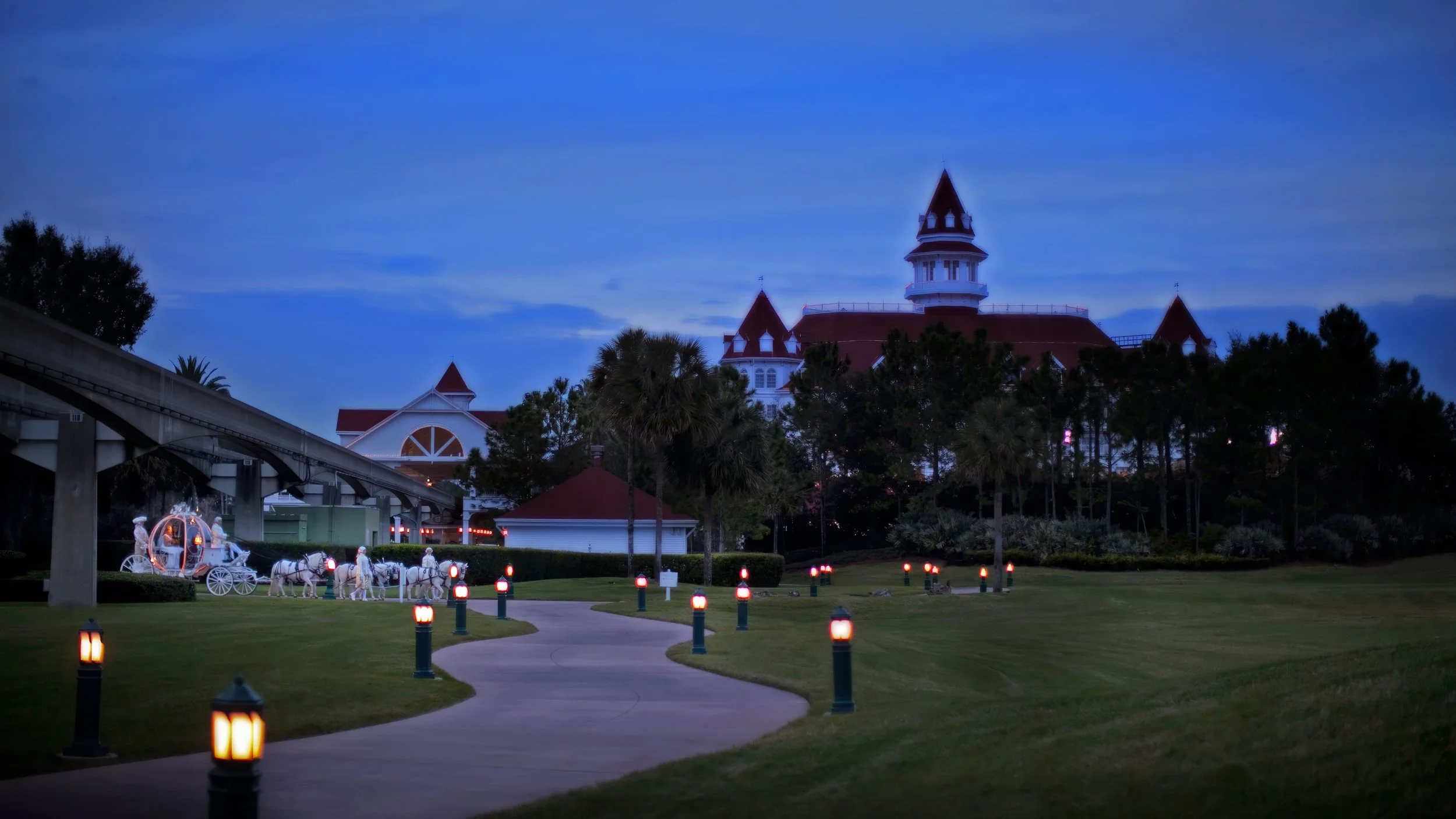 Cinderella’s pumpkin coach traveling from Disney’s Grand Floridian Resort to the Disney Wedding Pavilion for a Disney Dream Wedding ceremony.