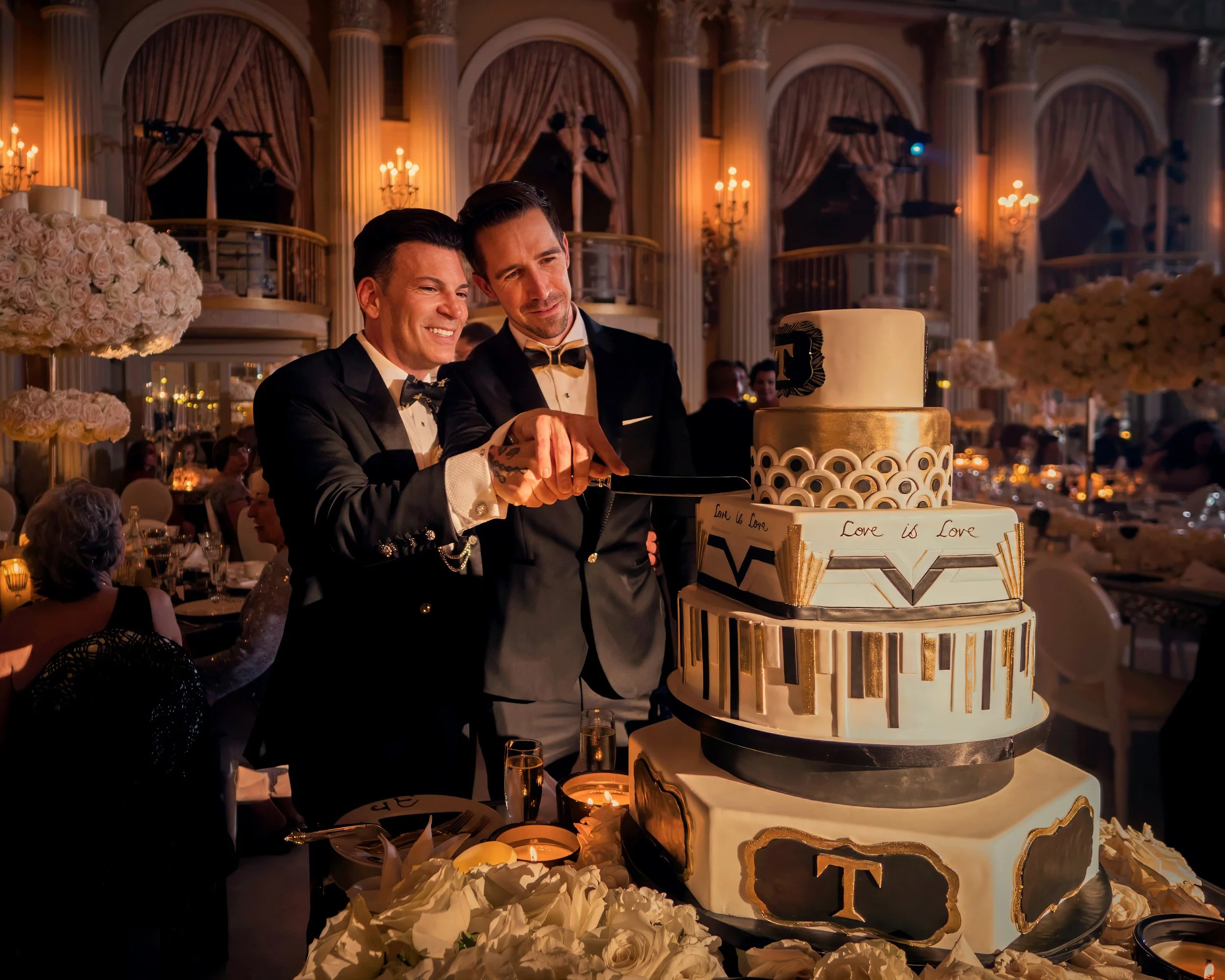Cake cutting in the grand ballroom wedding at the Millennium Biltmore Hotel in downtown Los Angeles.