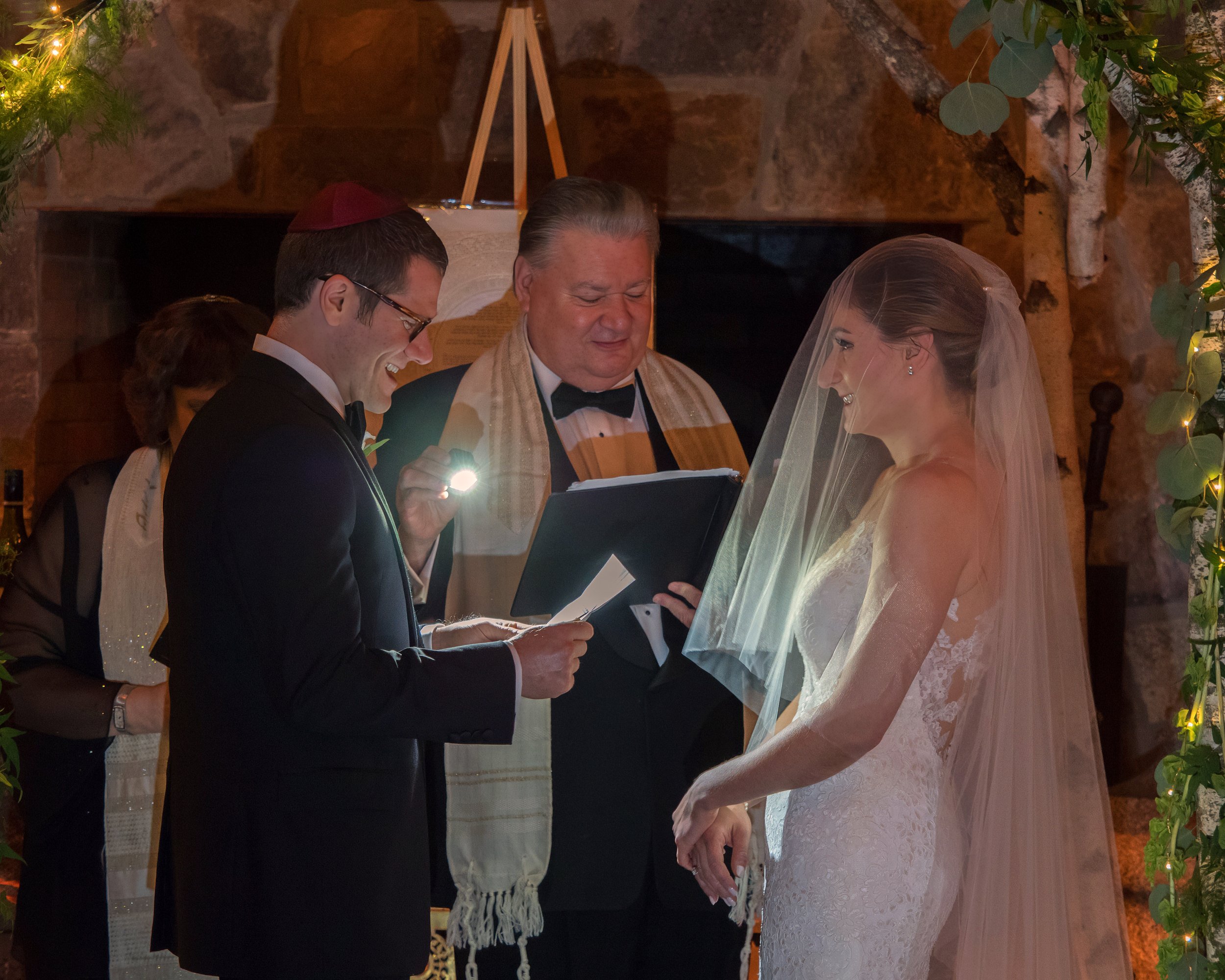 Low light photography during a wedding reception in the party barn at Lion Rock Farm