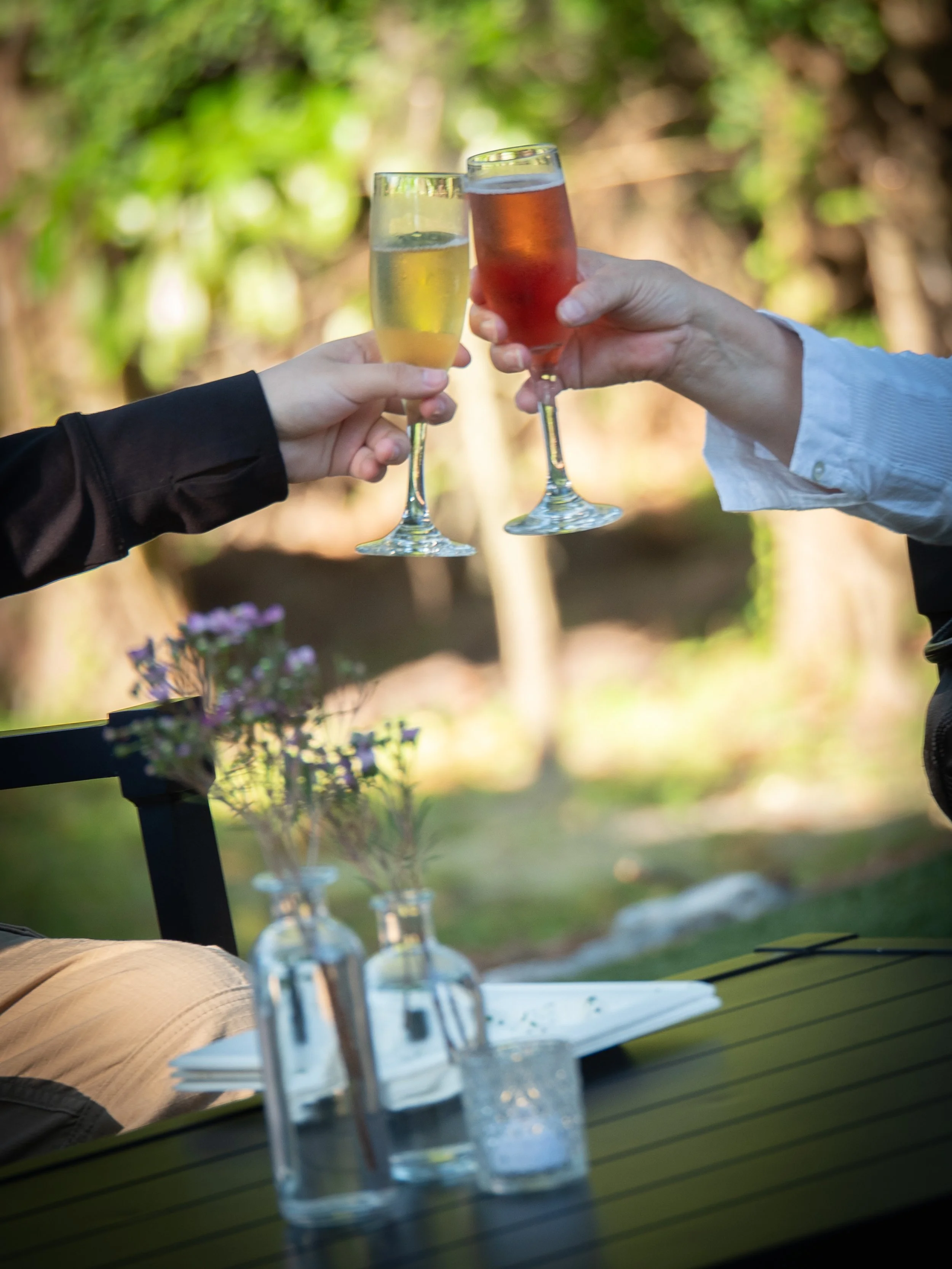 Guests raise glasses and celebrate together during a corporate event at The Mackey House in Savannah Georgia.