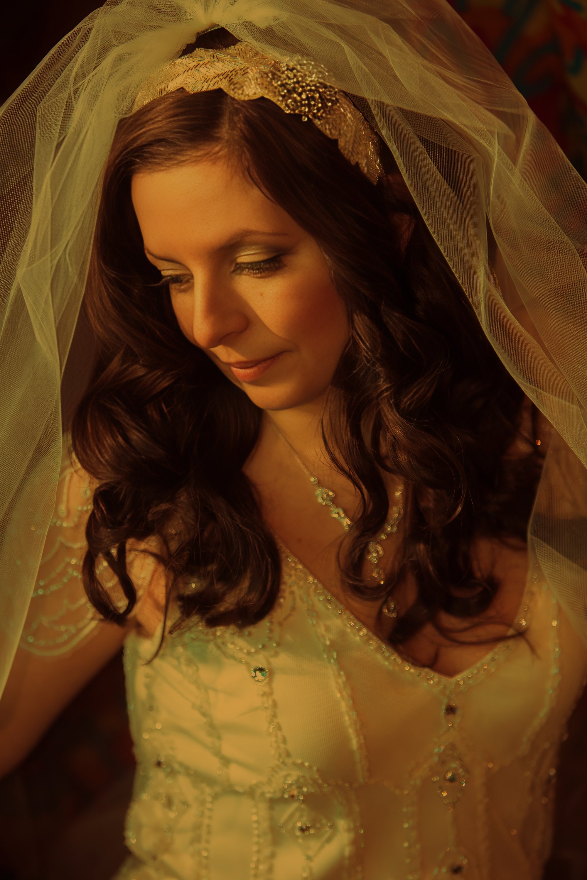 Elegant close-up portrait of the bride illuminated by soft window light at W Hoboken.