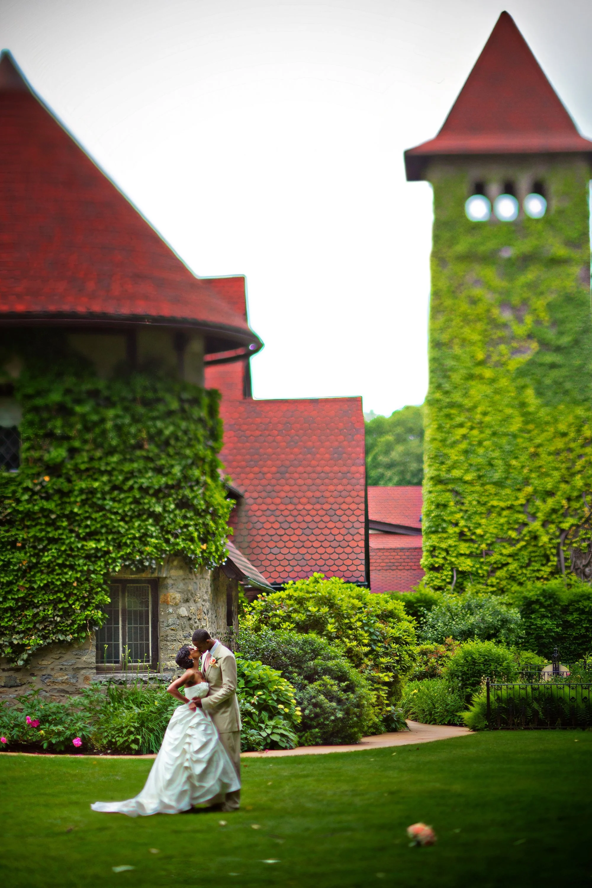 Bride and Groom kiss on the grounds of Saint Clements Castle