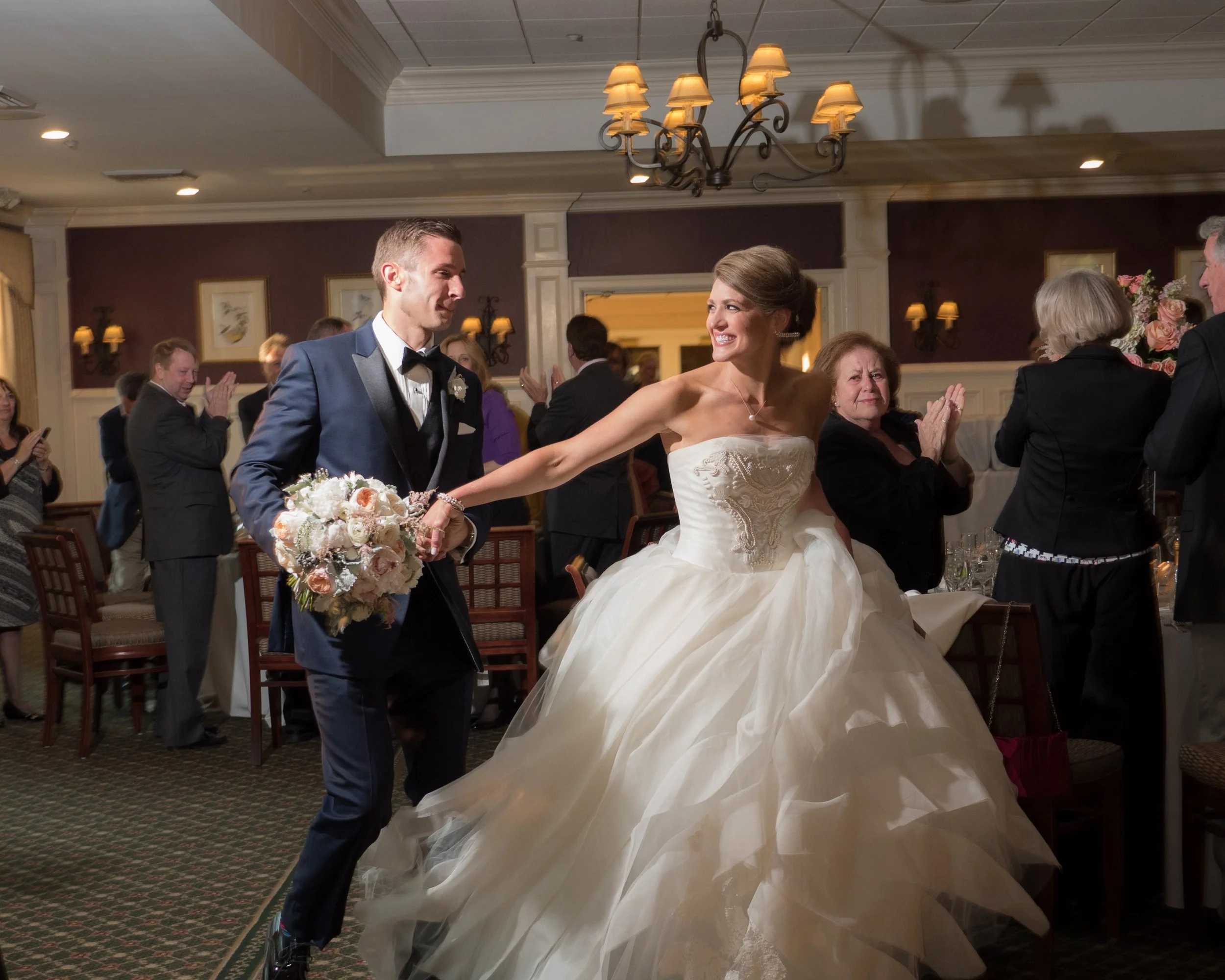 Bride and groom joyously announced into their wedding reception at Salem Golf Club.