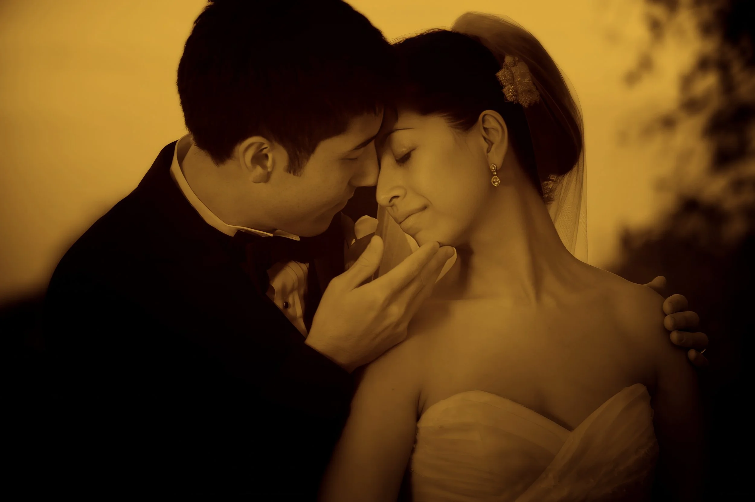 Romantic fine art closeup portrait of a bride and groom on the outdoor grounds of Glen Island Harbour Club