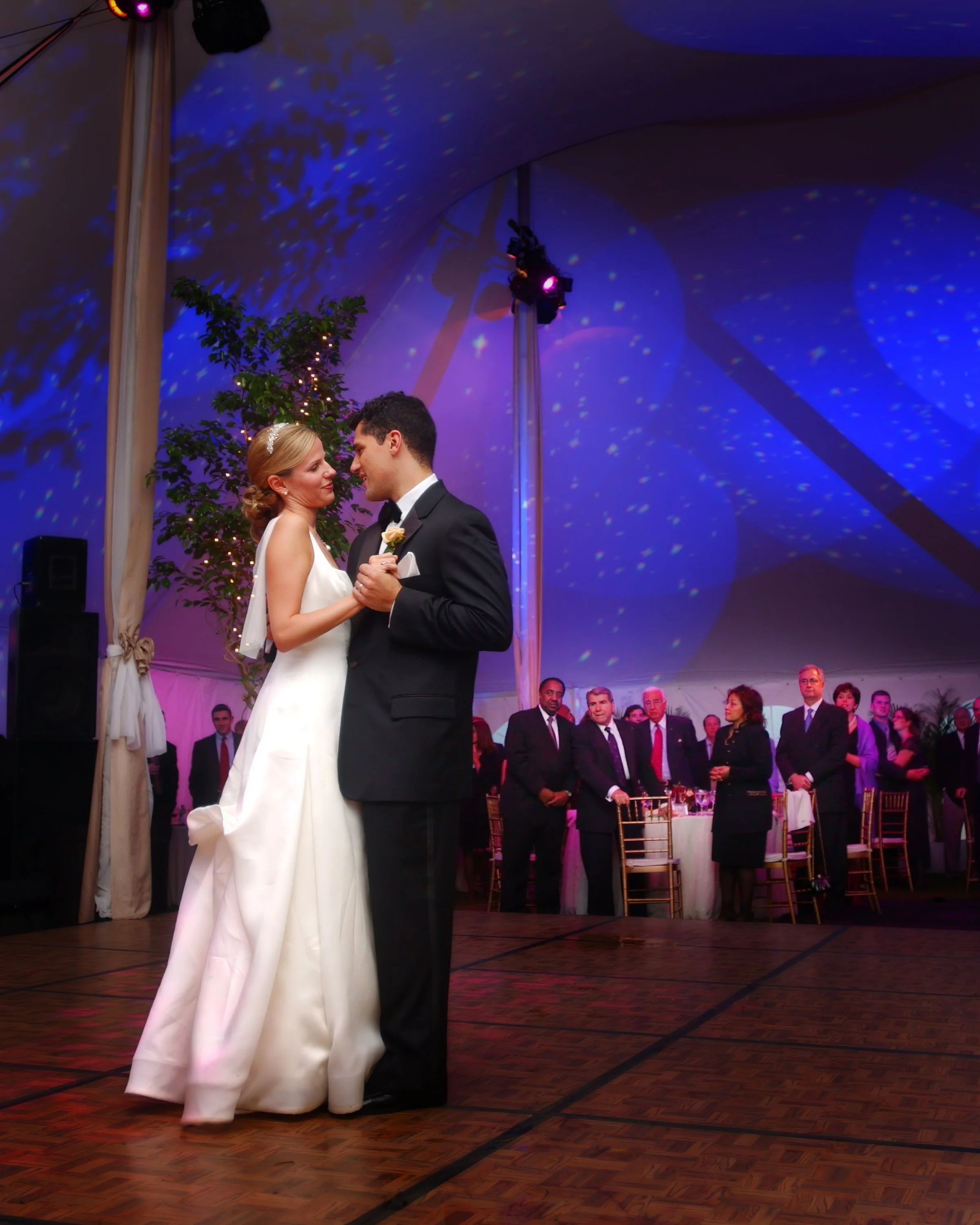 Bride and groom celebrating their first dance under a tent at Hill-Stead Museum in Farmington Connecticut.