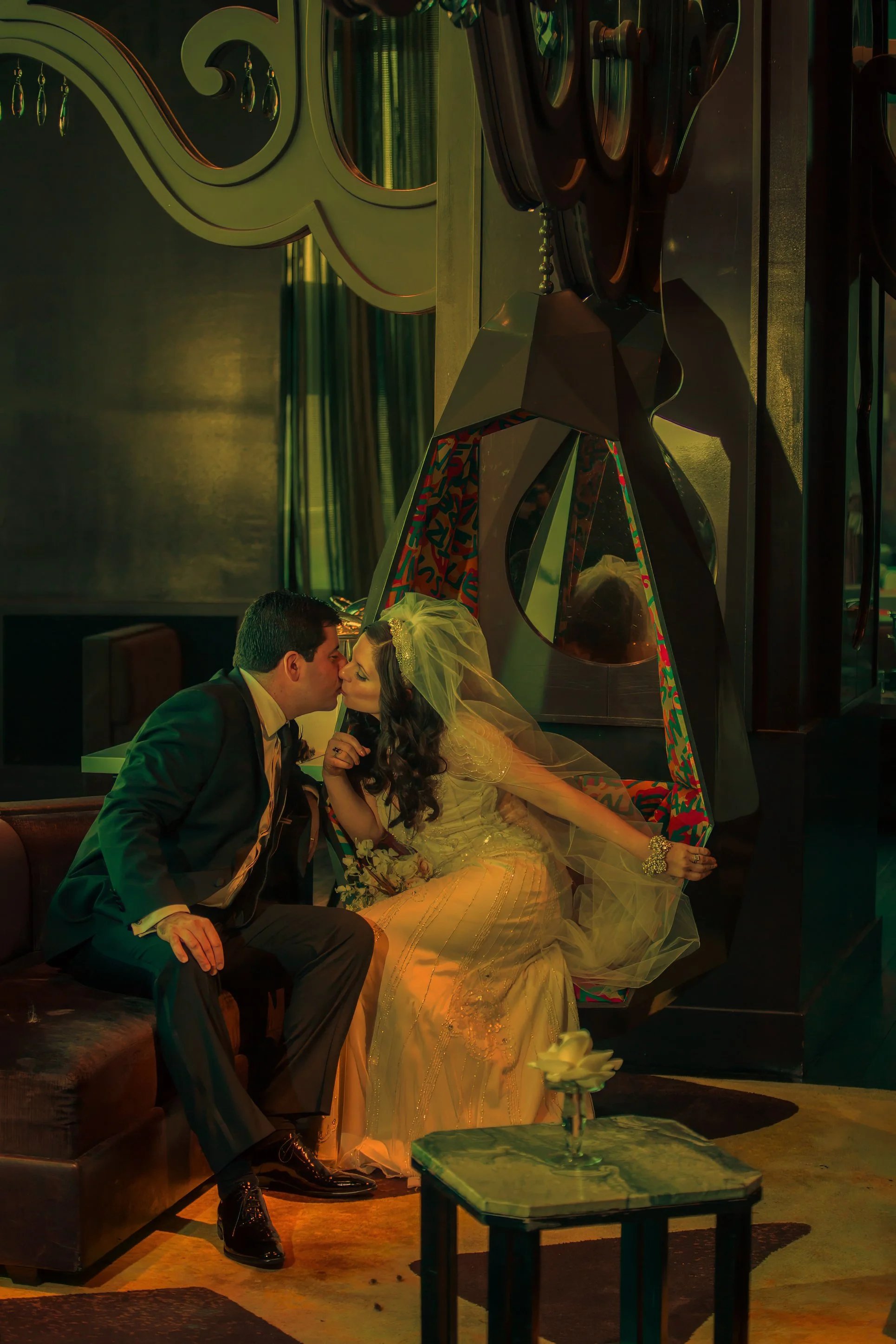 Bride and groom sharing a romantic kiss surrounded by the architecture and charm of W Hoboken.