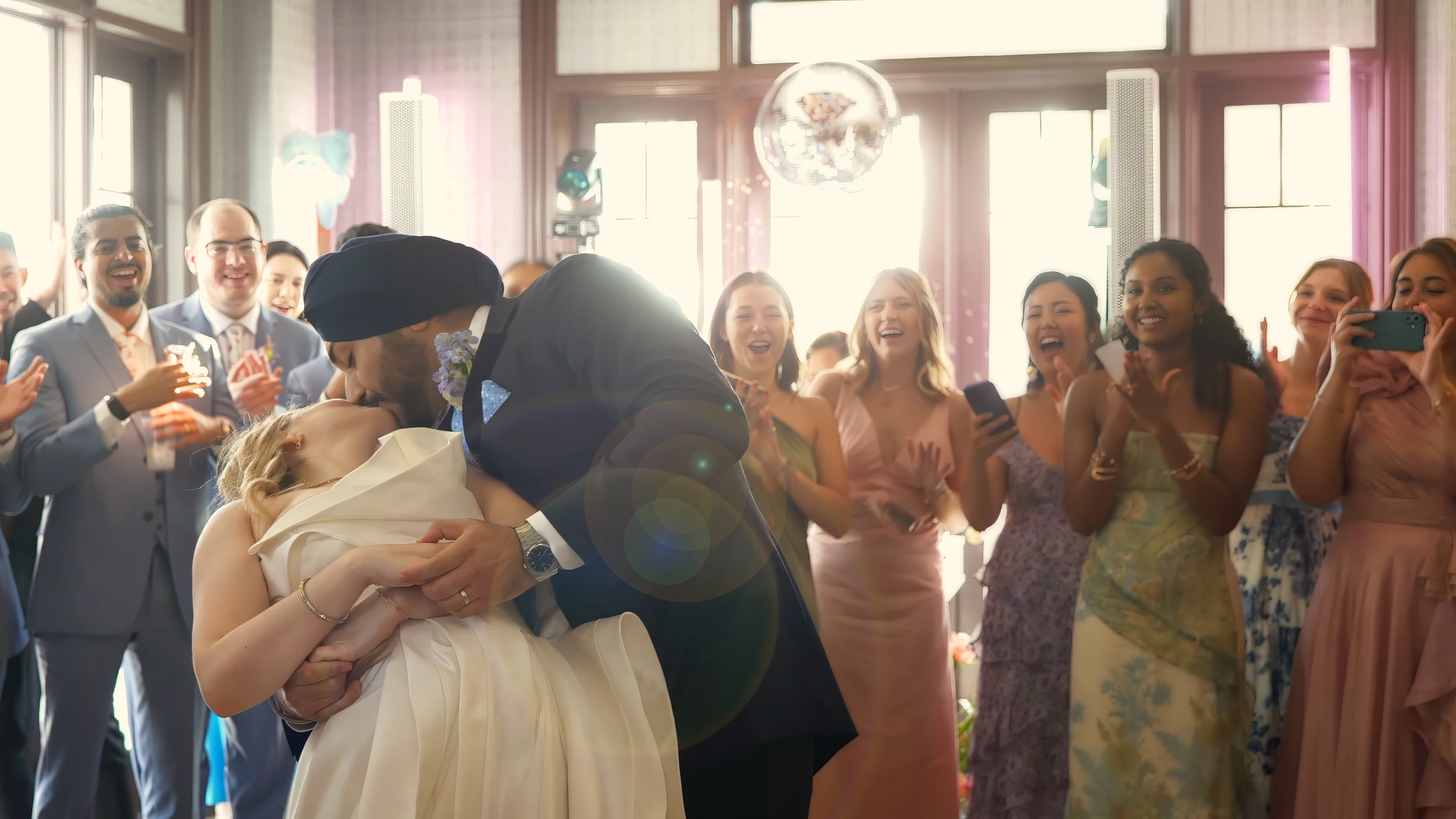 Groom dips bride for kiss during first dance South Carolina Yacht Club wedding Hilton Head
