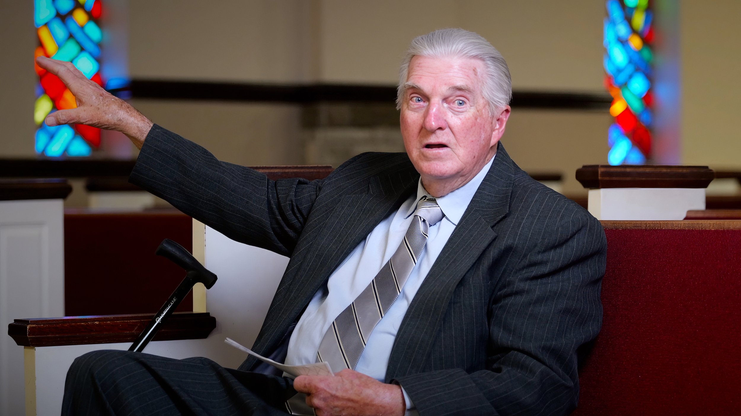 Arnold Wooten, a 62-year member of South Gastonia Church of God, sharing personal memories during a professionally directed church history documentary interview.