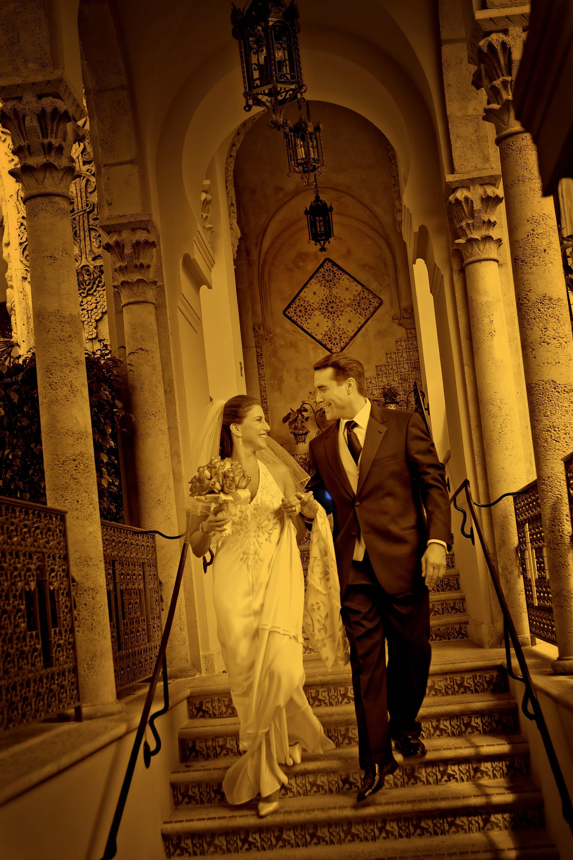 Fine art split toned photograph of bride and groom exploring the Mar-a-Lago property