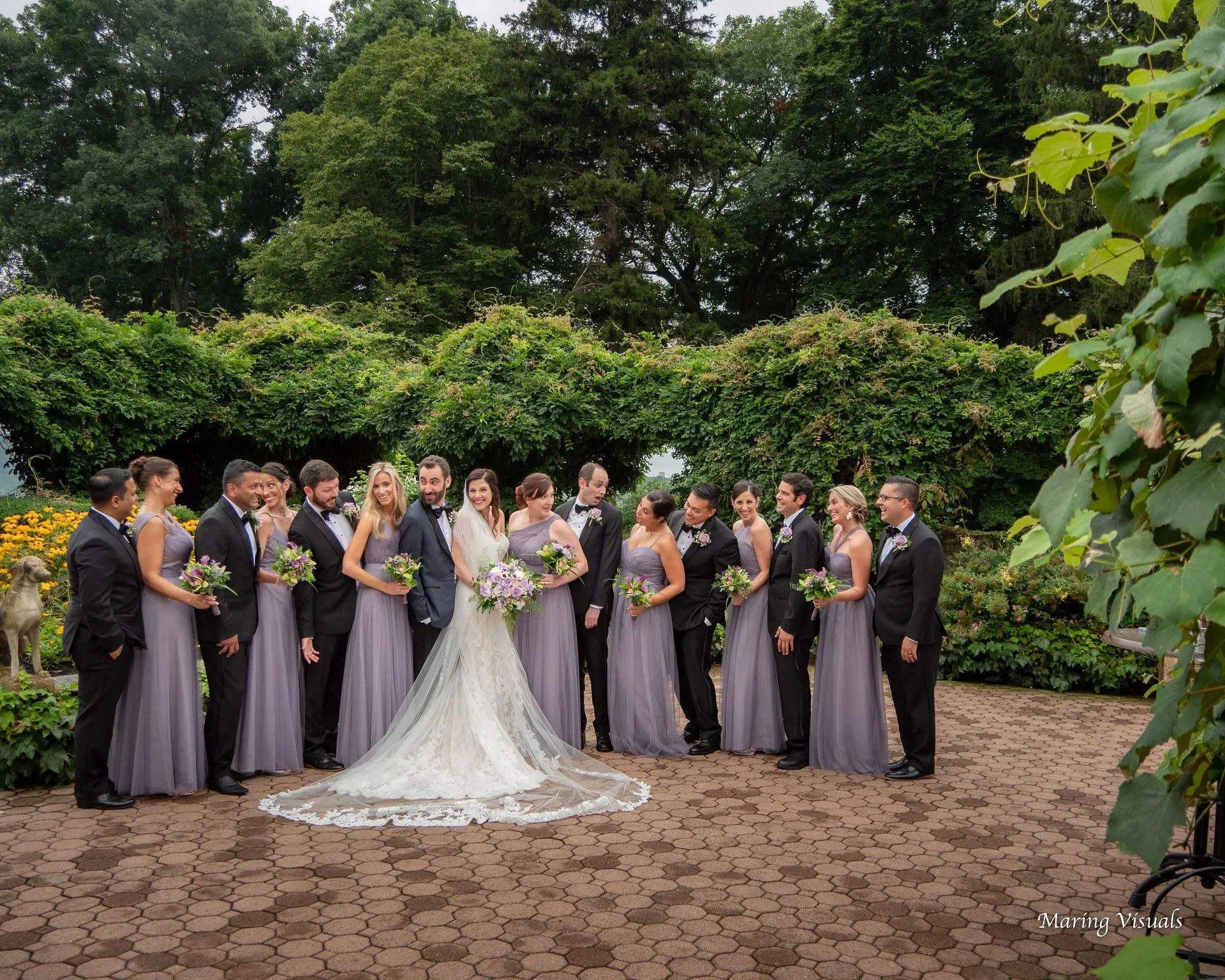 Relaxed bridal party photos in the Saint Clements Courtyard