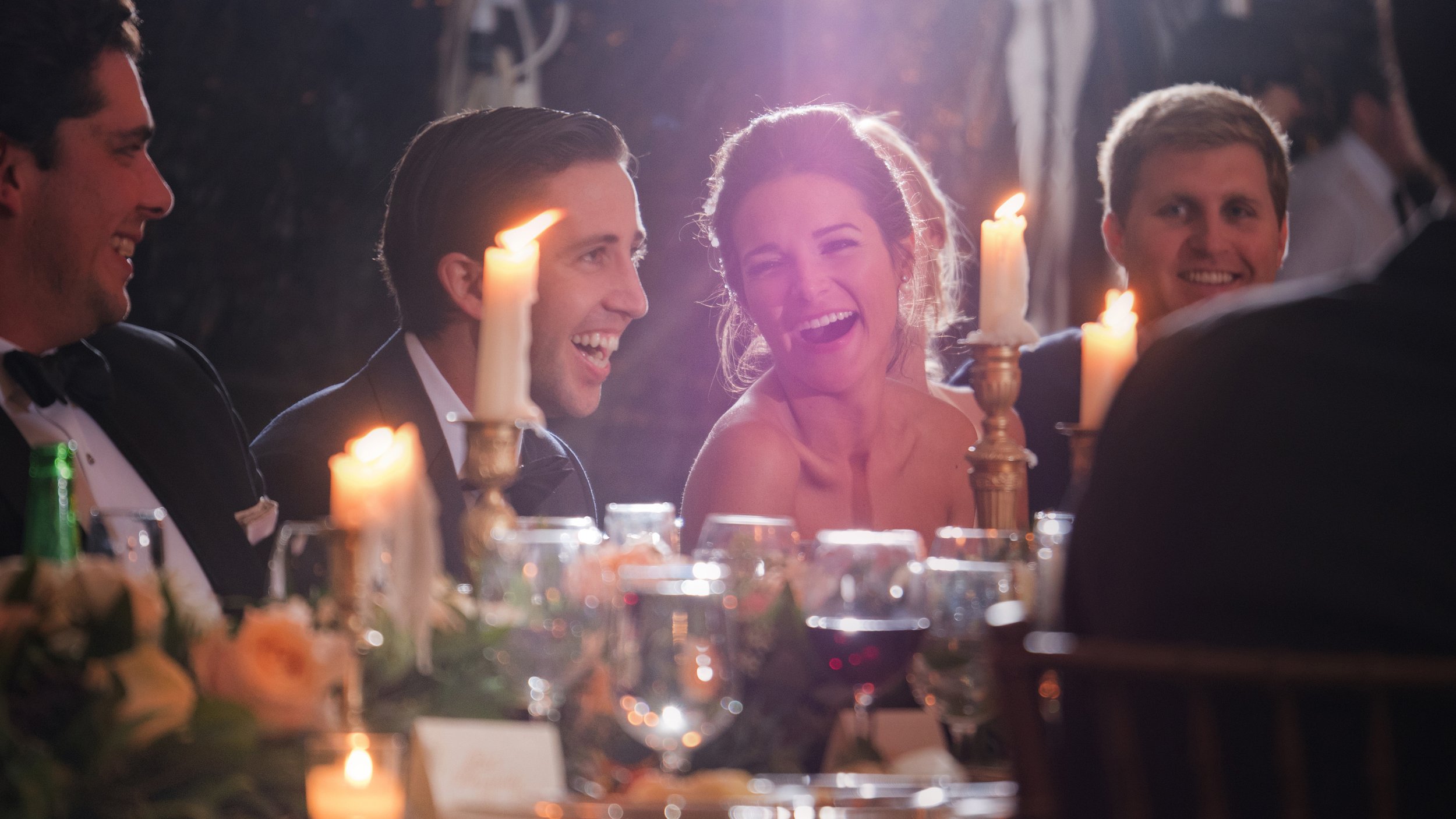 Bride and groom laughing at their reception toast at Lion Rock Farm in Litchfield, Connecticut
