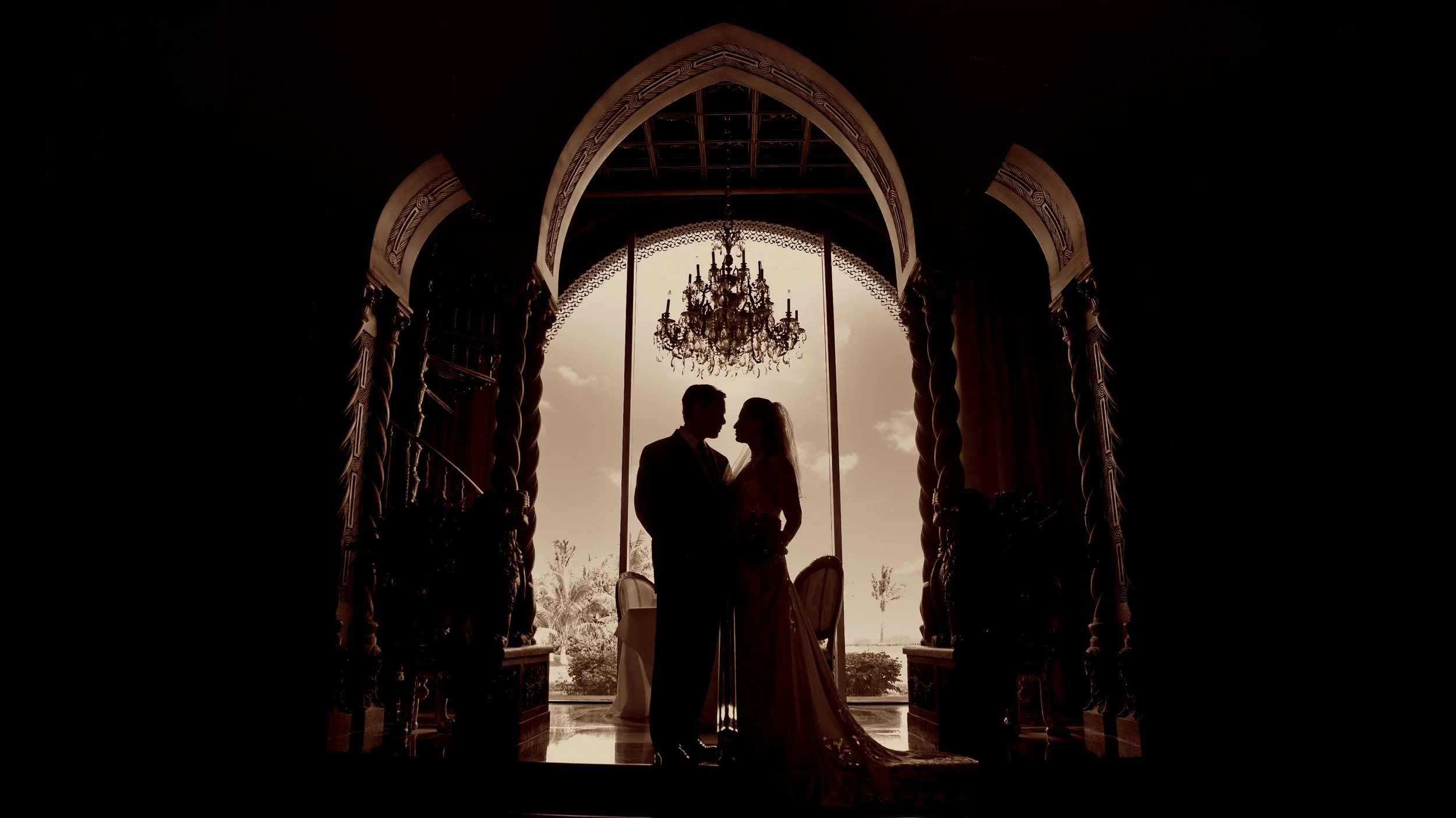 Romantic silhouette wedding portrait at Mar a Lago in Palm Beach Florida during a luxury evening celebration