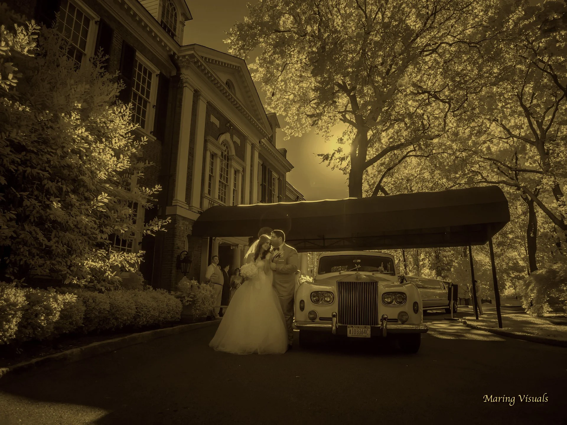 Bride and Groom at the entrance of the Coveleigh Club in Westchester New York