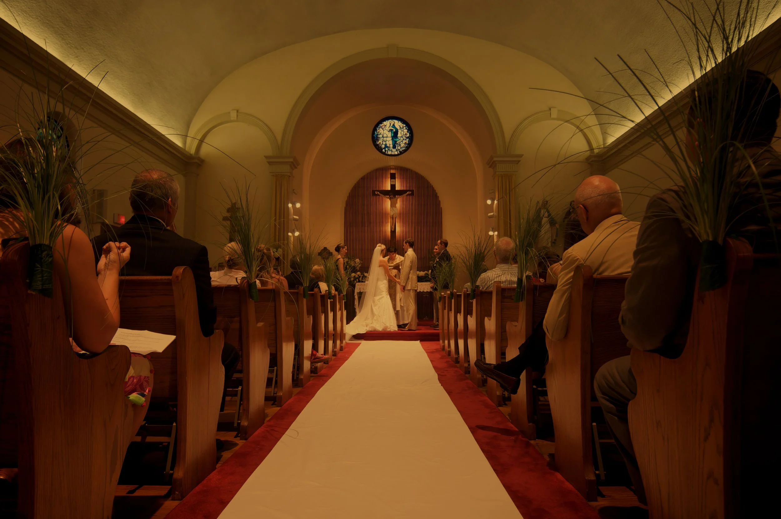 Interior view of the wedding ceremony at Immaculate Conception Roman Catholic Church in The Hamptons