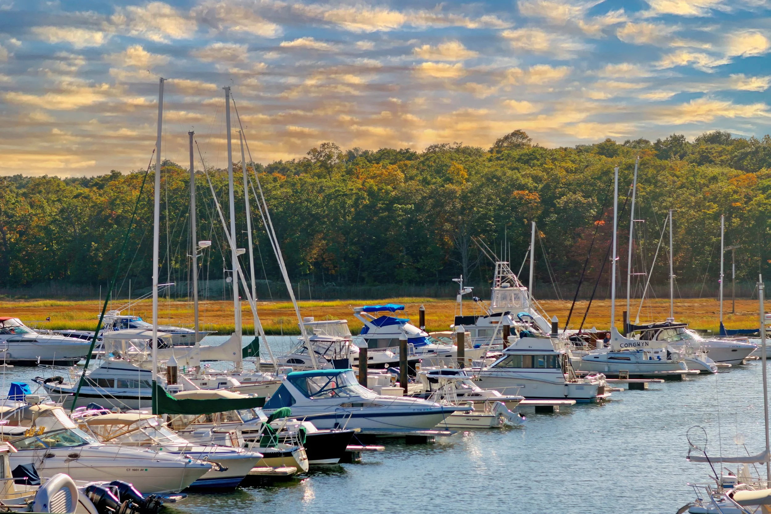 Sailboats docked in the marina at Guilford Yacht Club along Long Island Sound.