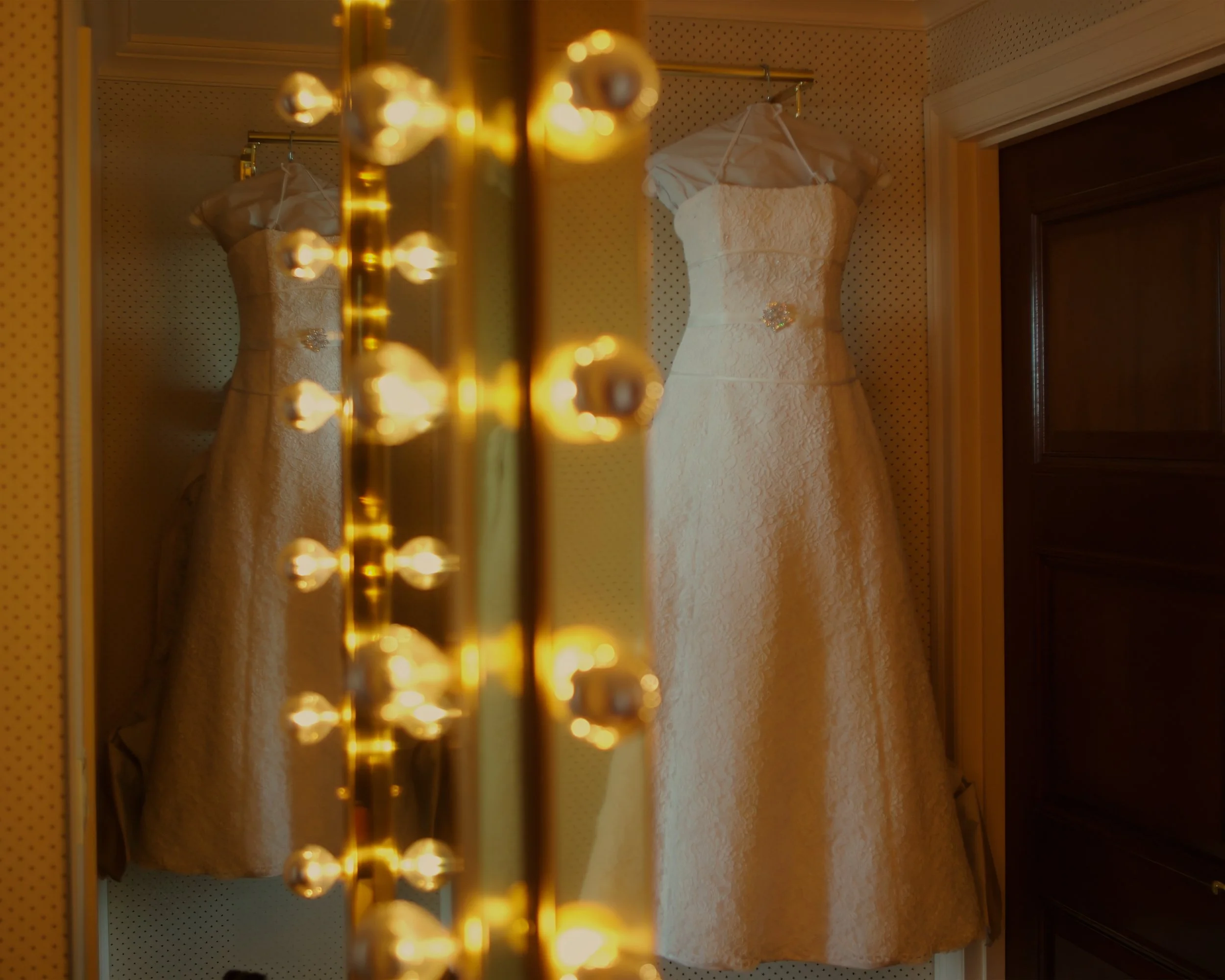 Wedding dress hung with care in the bridal suite at Glen Island Harbour Club