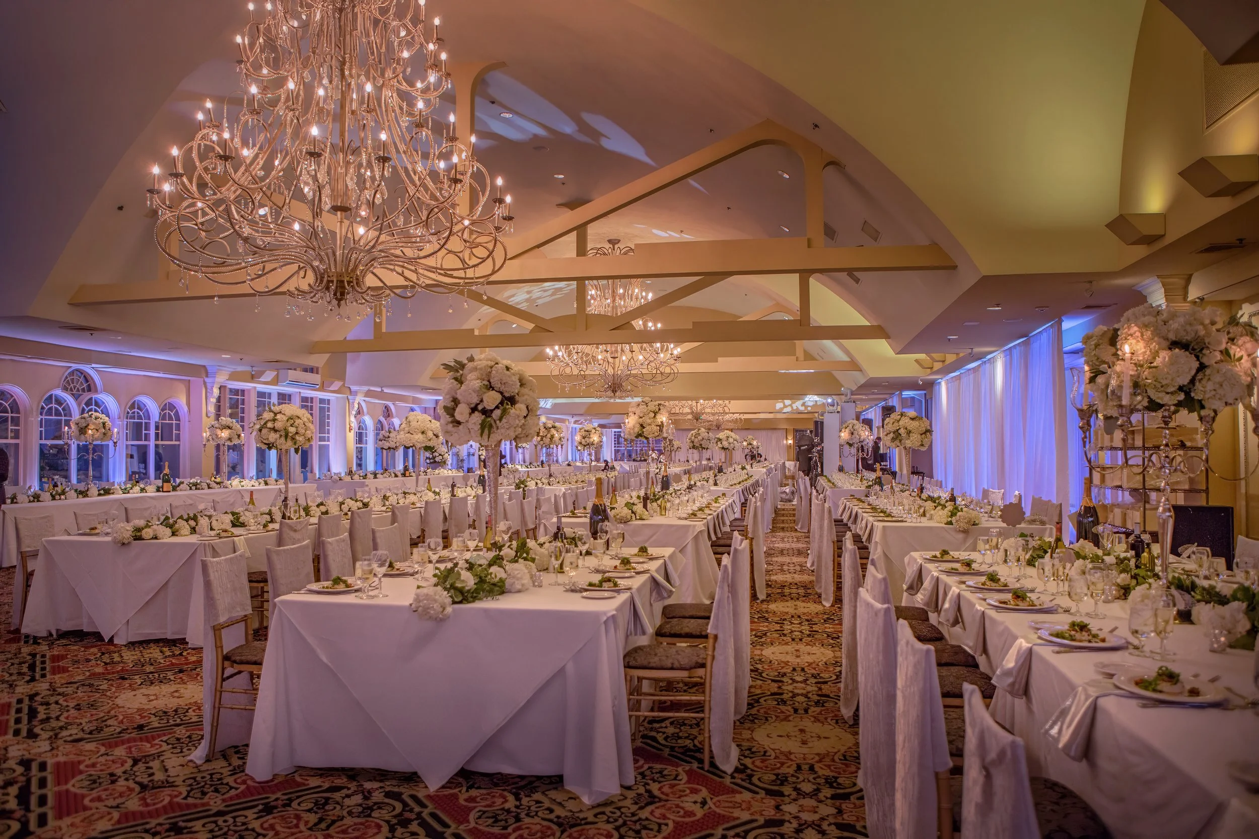 Wide view of wedding reception decor in the Waterview ballroom in Monroe, Connecticut
