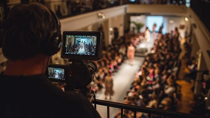 Professional video production team filming a corporate event in Connecticut.