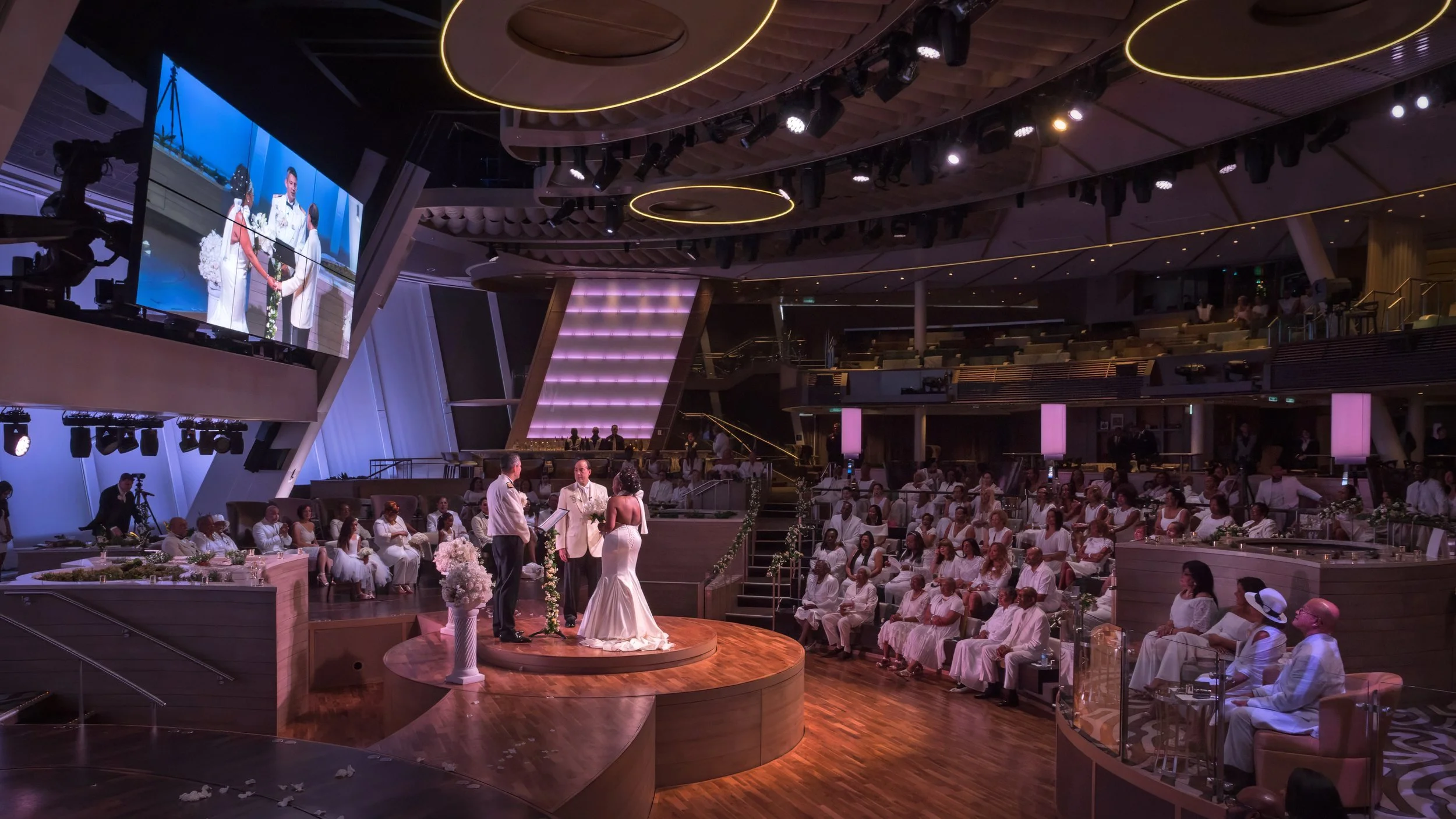 Elegant wedding aboard a Celebrity Cruises ship surrounded by ocean views.
