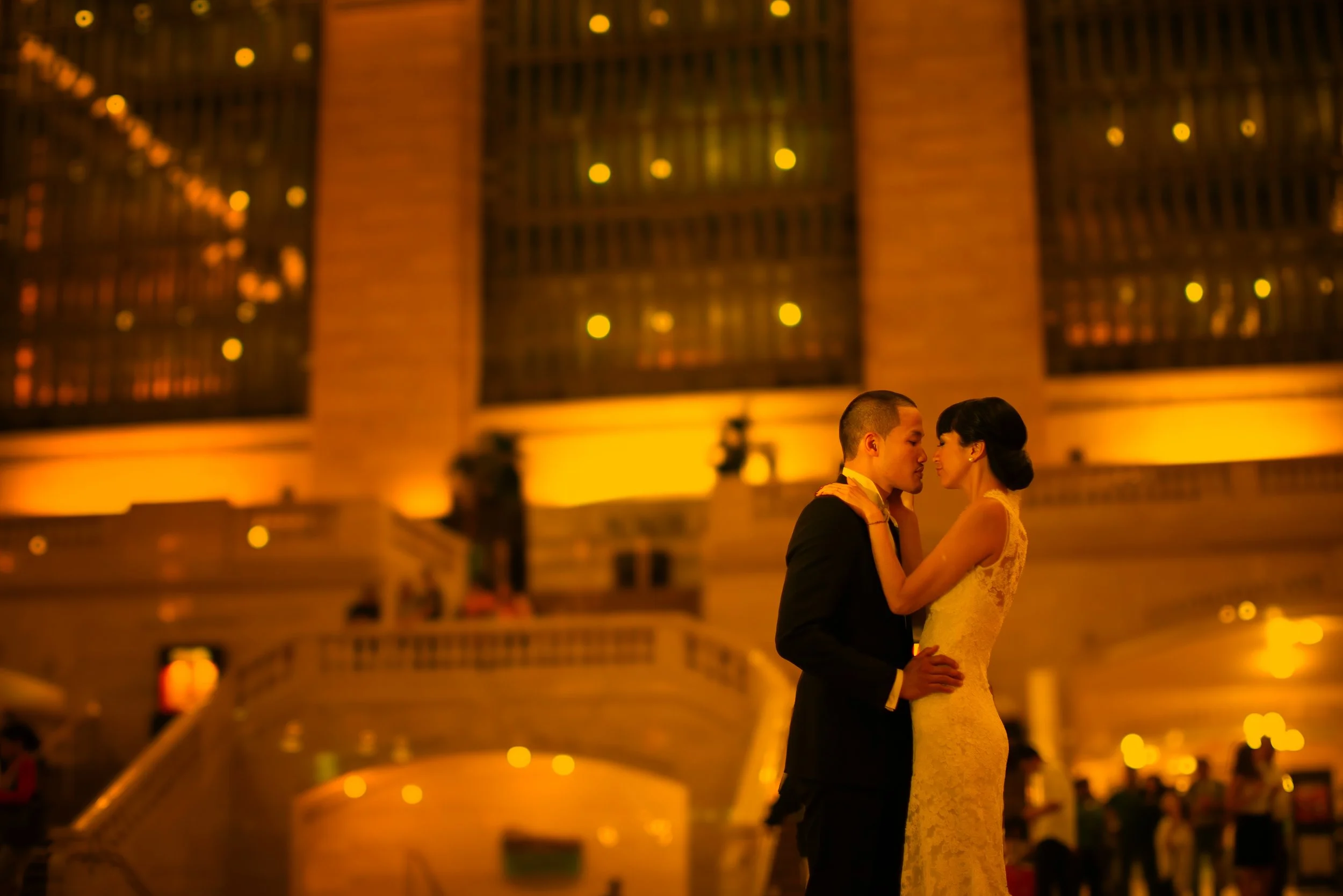 Bride and groom sharing a romantic moment at Grand Central Terminal near Cipriani 42nd Street in New York City.