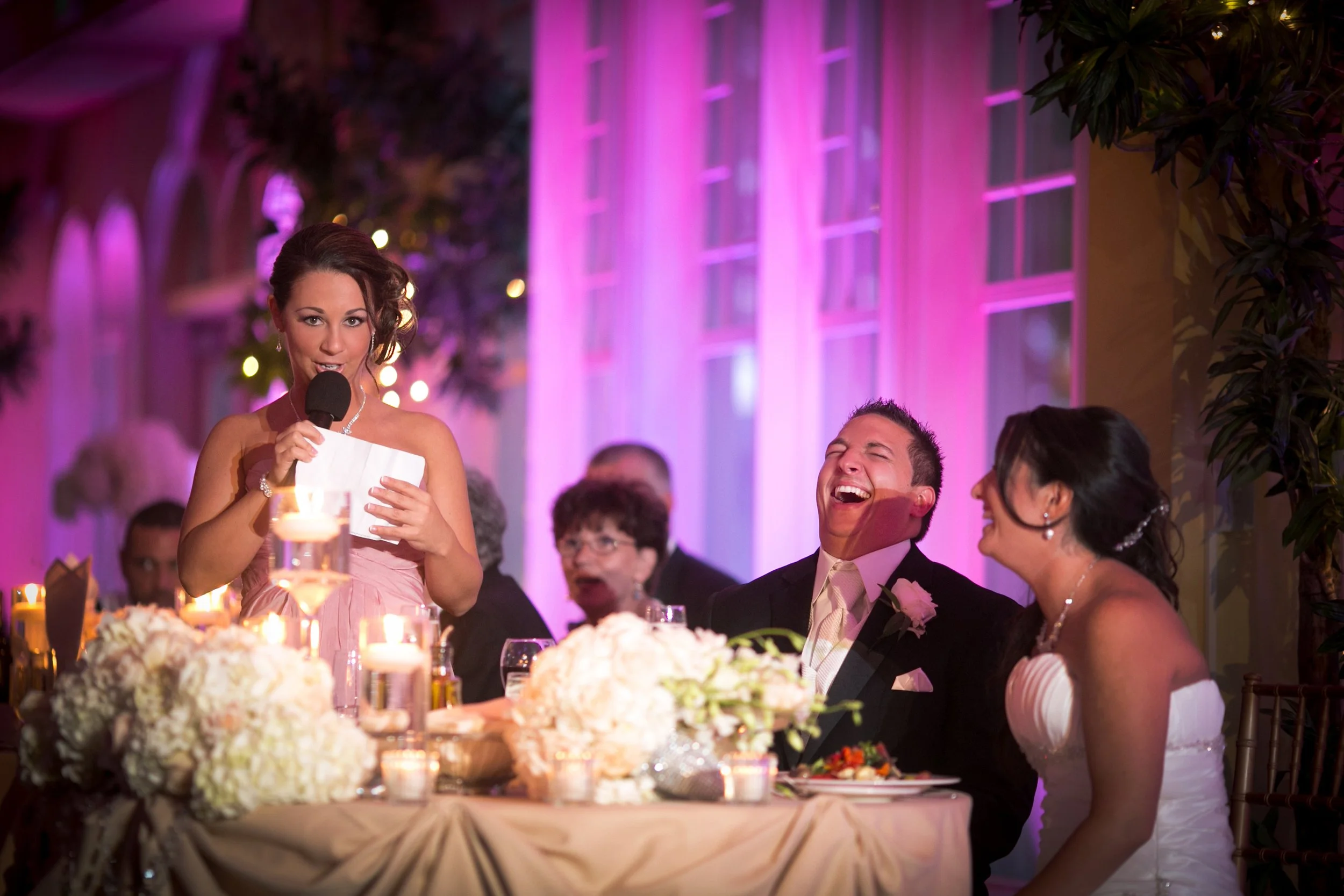 Bride and groom laughing during a wedding toast at Waterview in Monroe, Connecticut