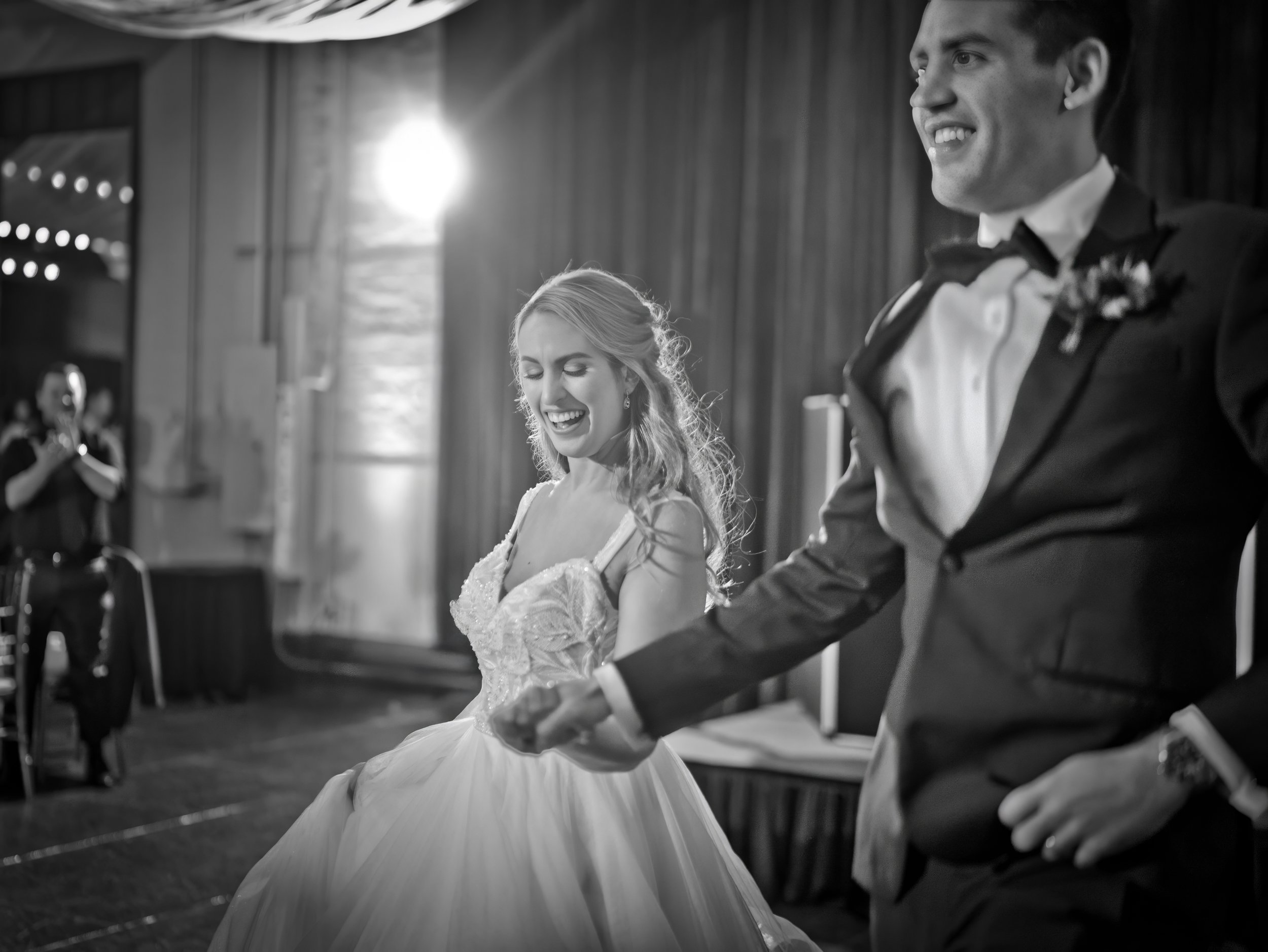 Savannah wedding photographer Charles Maring captures the bride and groom announced into their wedding reception at Savannah Station