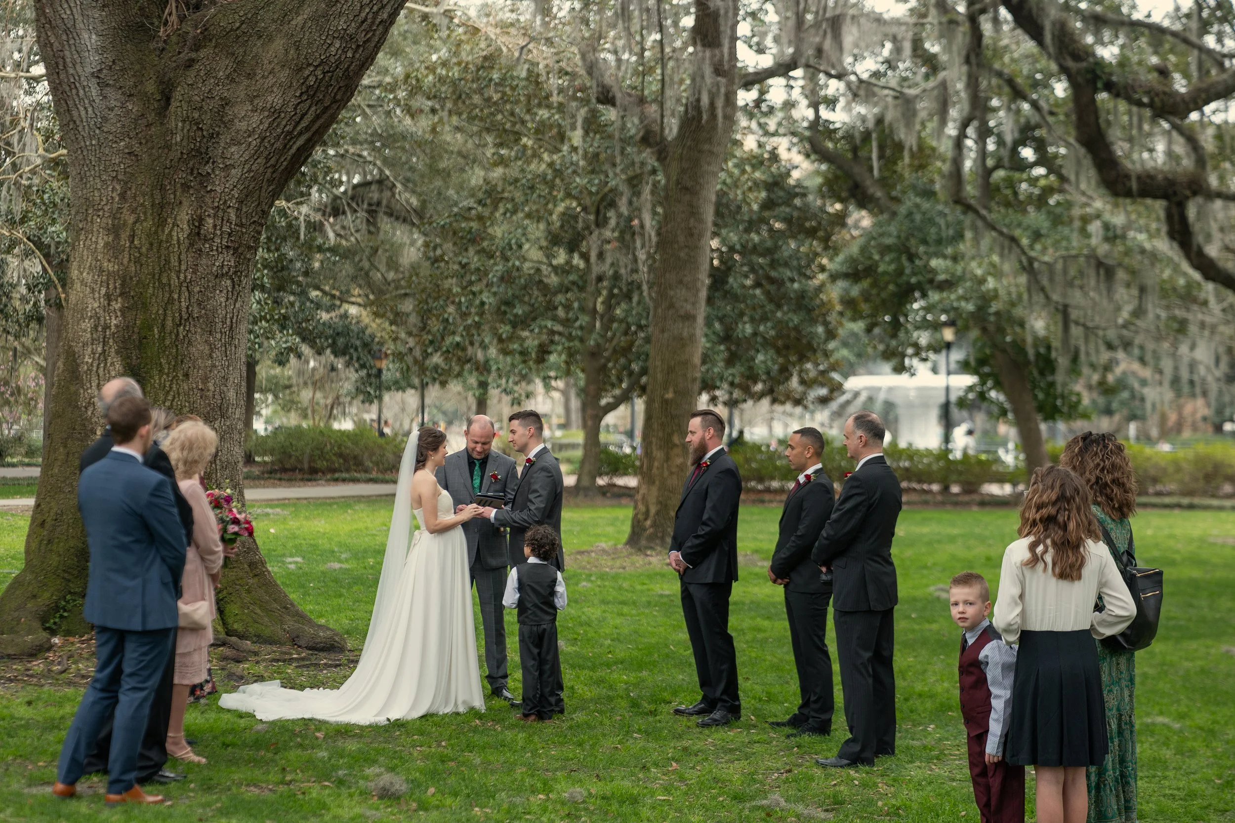 Savannah elopement packages ceremony under live oaks in Forsyth Park with family and friends