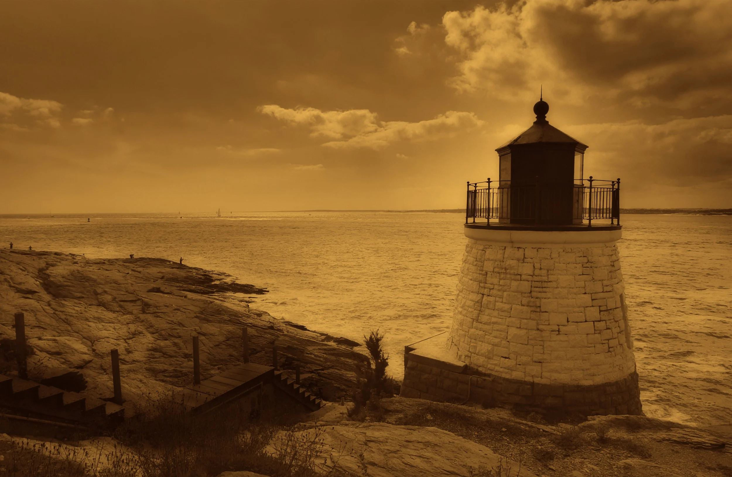 Fine art split-tone photograph of the lighthouse at Castle Hill Inn overlooking the ocean in Newport, Rhode Island.