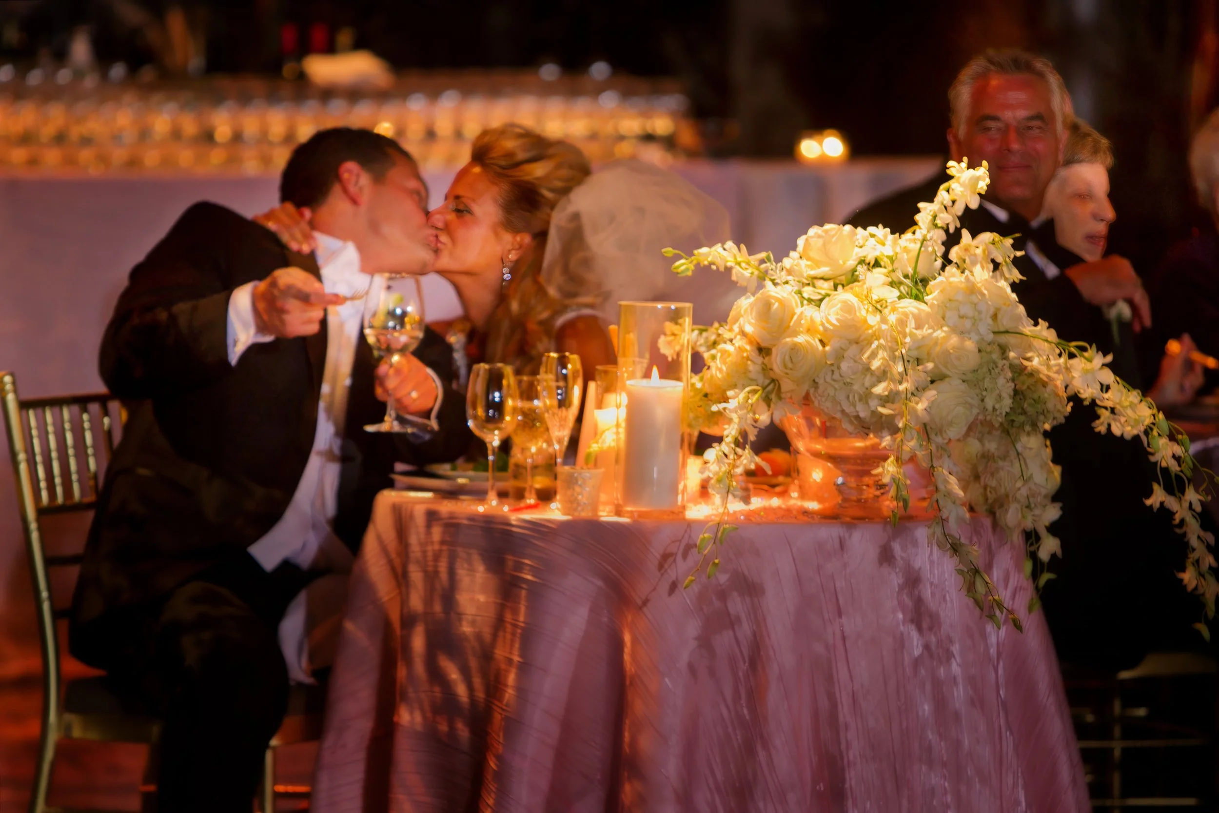 Bride and Groom Share a Playful Kiss During Wedding Dinner at Cipriani 42nd Street