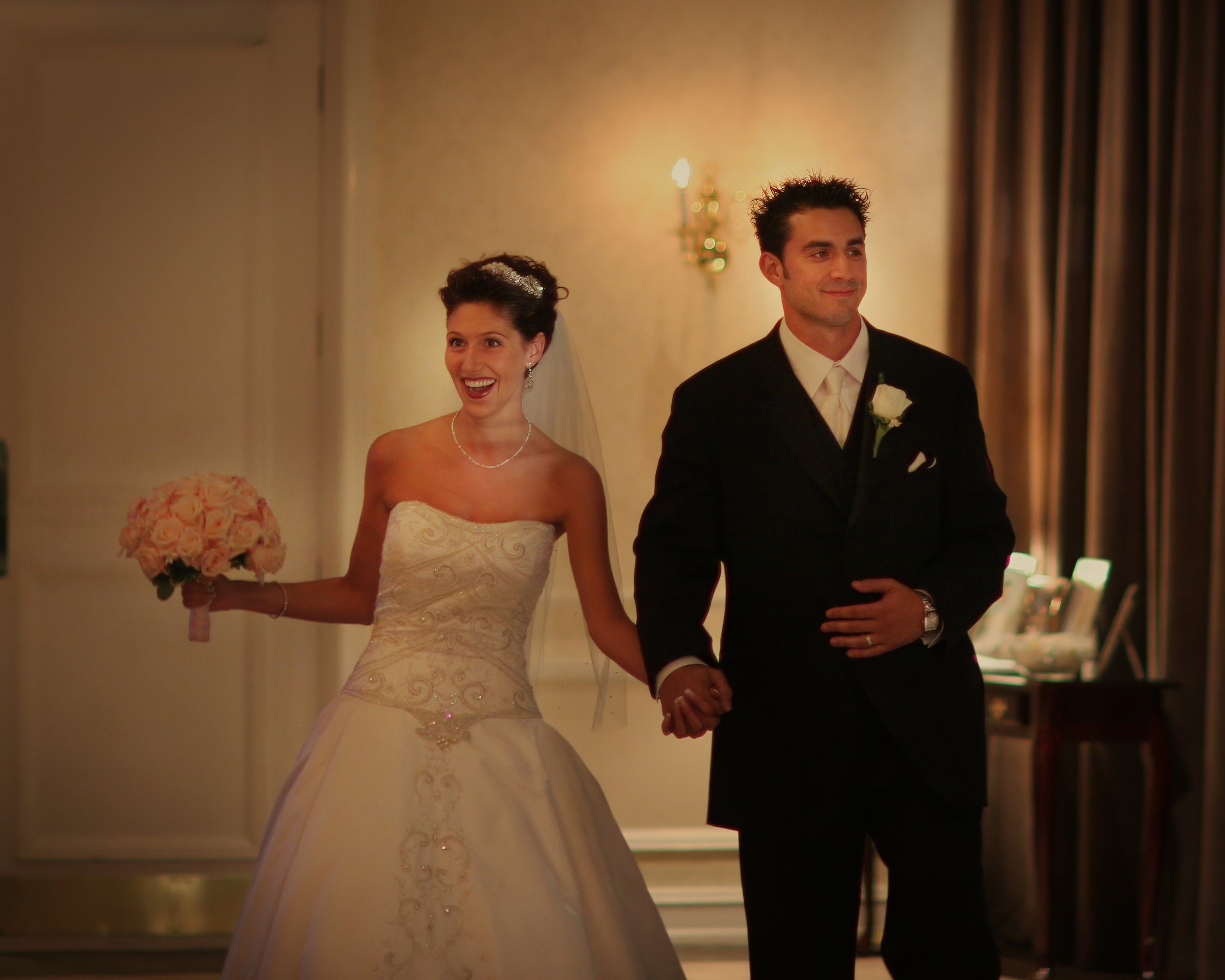 Bride and groom are announced into their Aqua Turf wedding reception