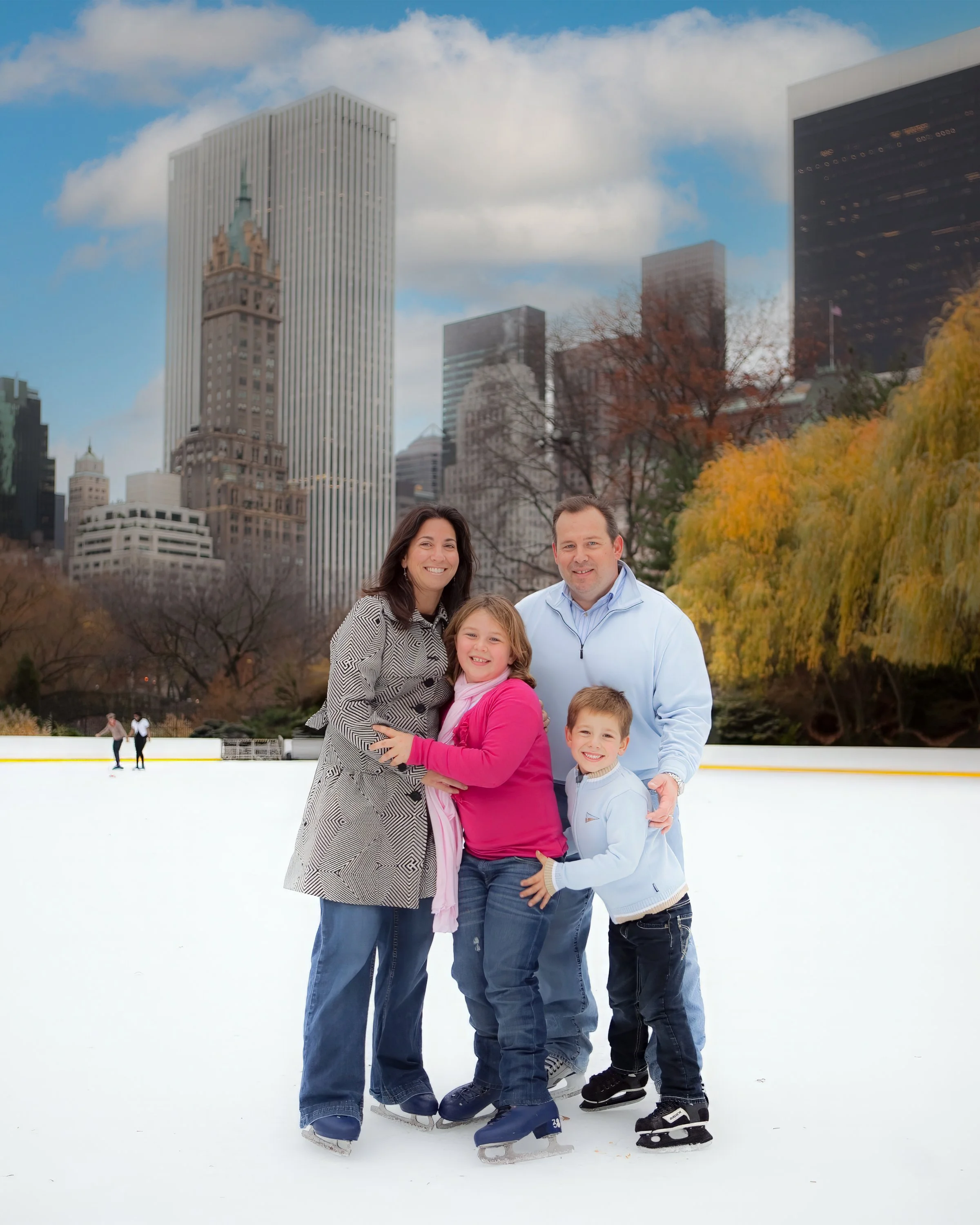 Family portrait in NYC at the Wollman Rink winter Central Park