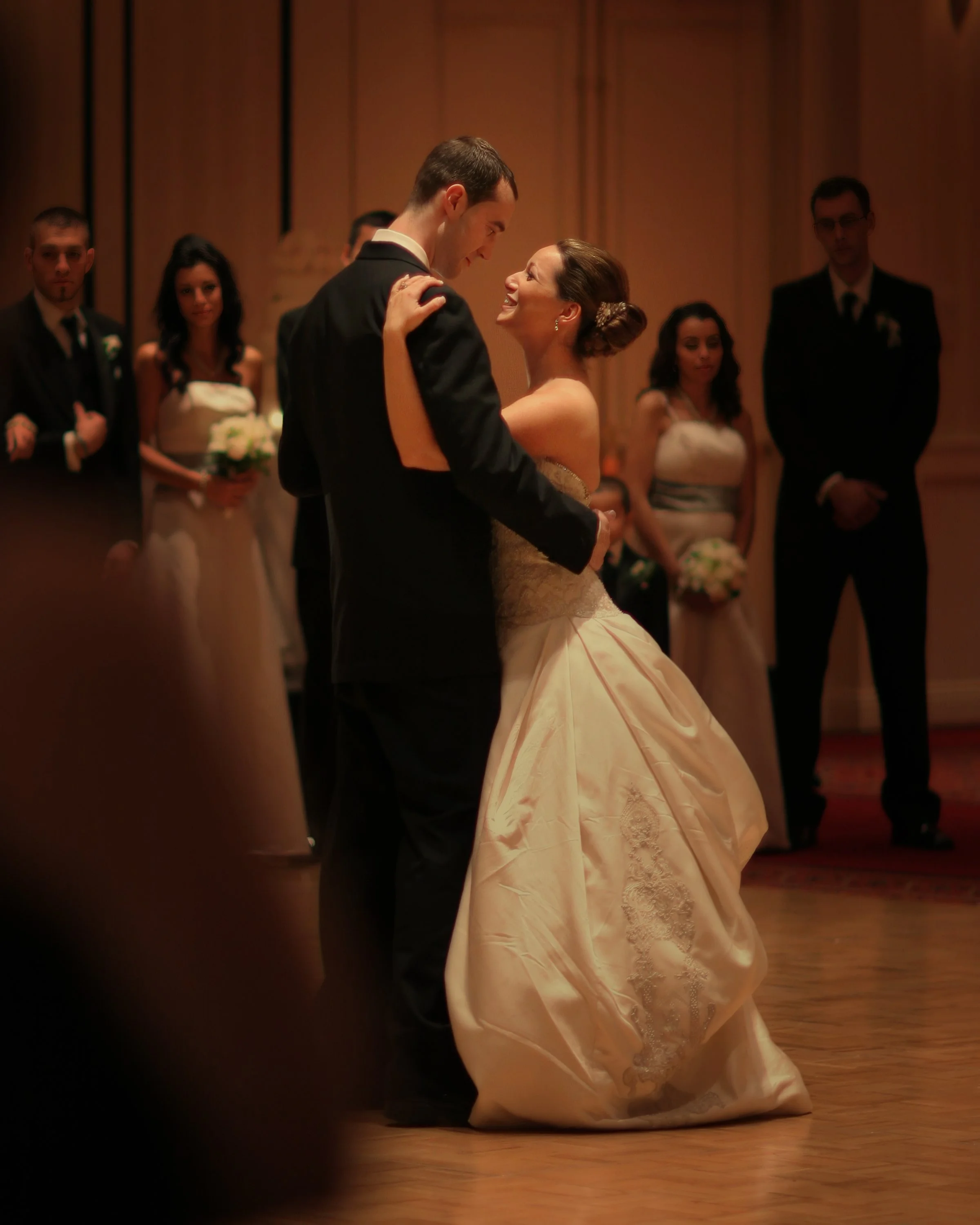 Bride and groom sharing their first dance in the ballroom at the Mystic Marriott Hotel and Spa.